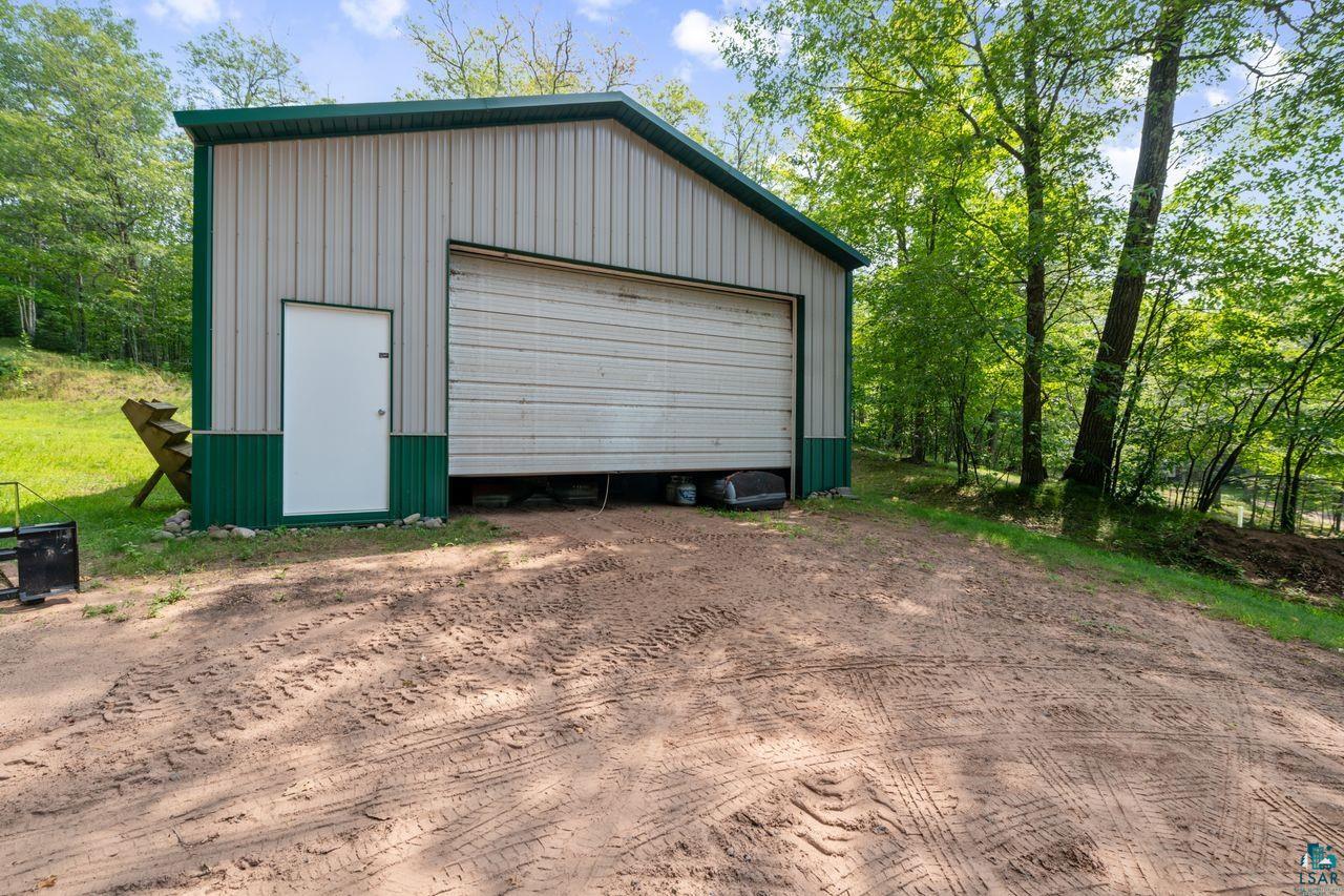9505 Wildwood Campground Road Iron River, WI 54847 - Photo 19 of 34 View of garage