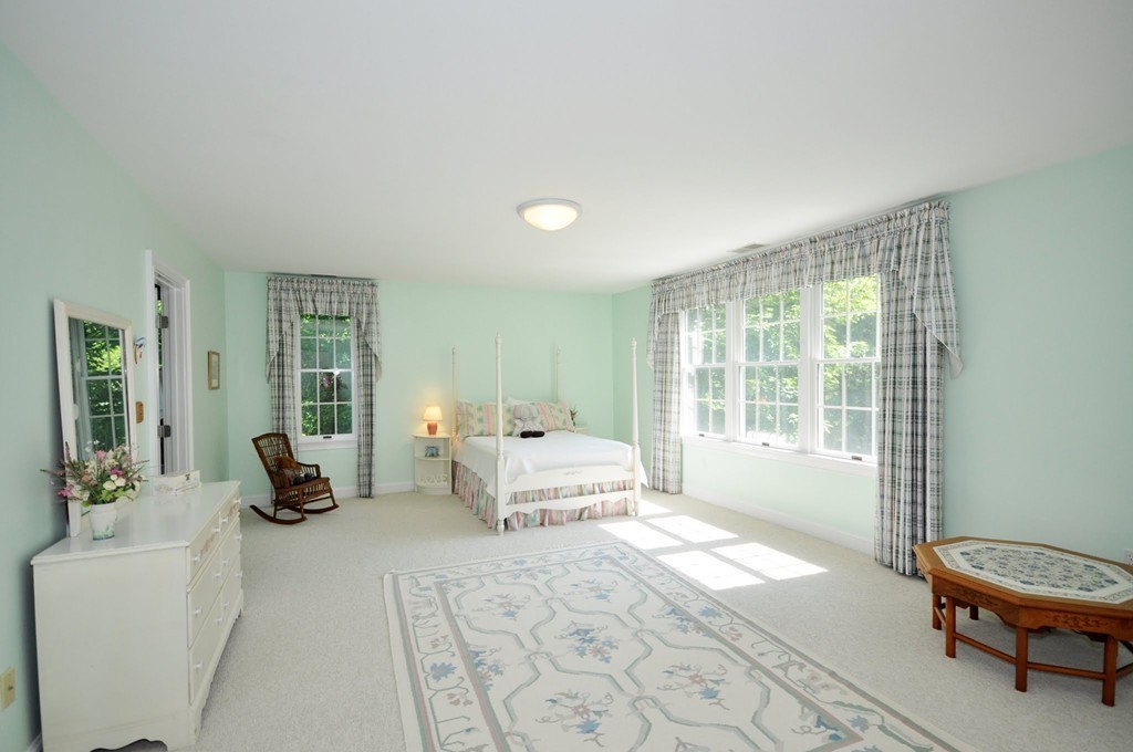 75 Channing Road Concord, MA 01742 - Photo 13 of 19 a living room with furniture and a large window