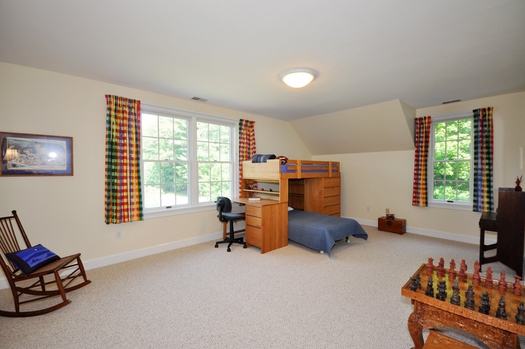 75 Channing Road Concord, MA 01742 - Photo 14 of 19 a bedroom with furniture and a large window