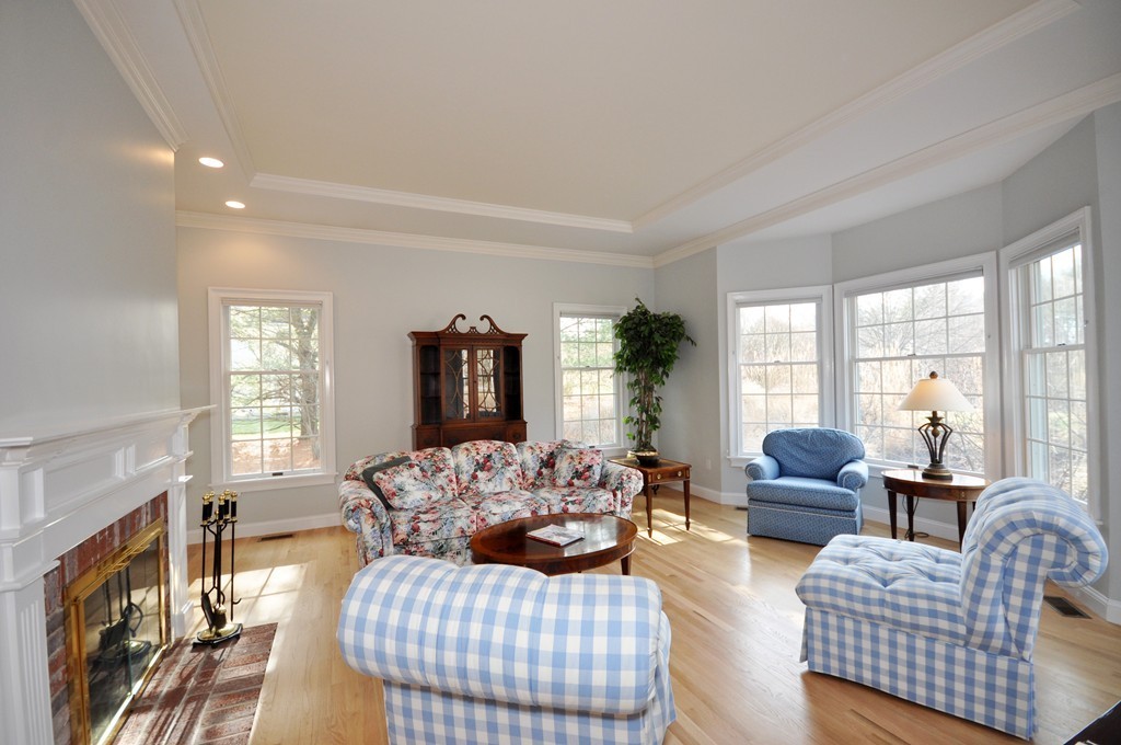 75 Channing Road Concord, MA 01742 - Photo 8 of 19 a living room with furniture fireplace and a large window