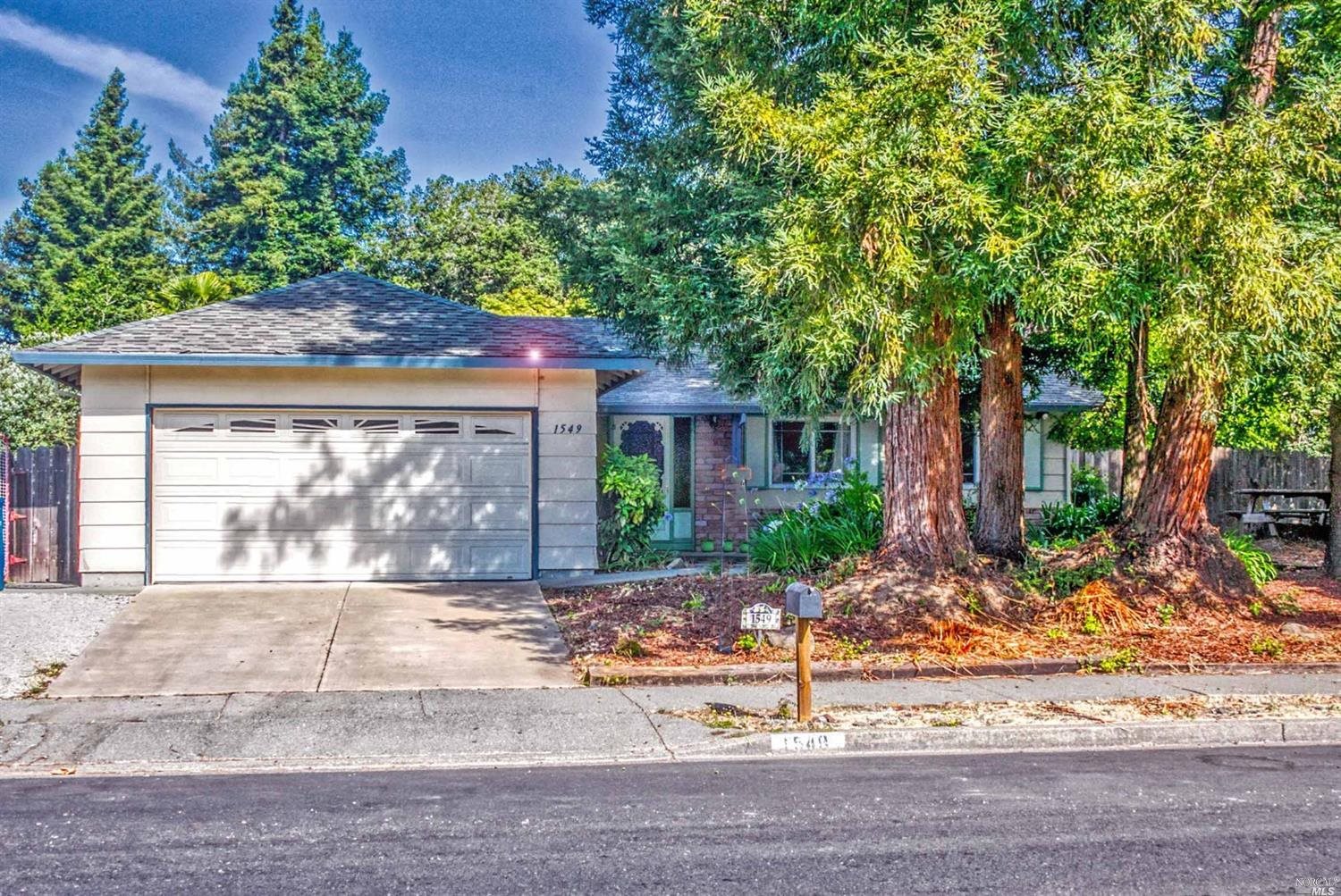 1549 Cunningham Way Santa Rosa, CA 95403 - Photo 1 of 1 front view of a house with a yard