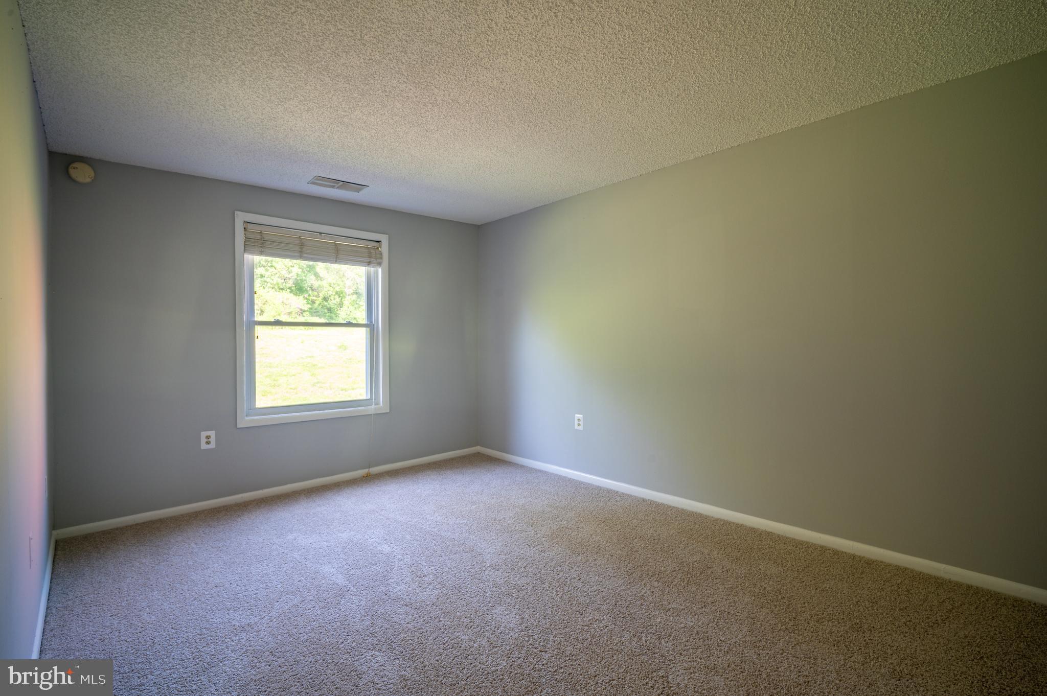 3815 Swann Road, Unit 103 Suitland, MD 20746 - Photo 16 of 23 an empty room with a window