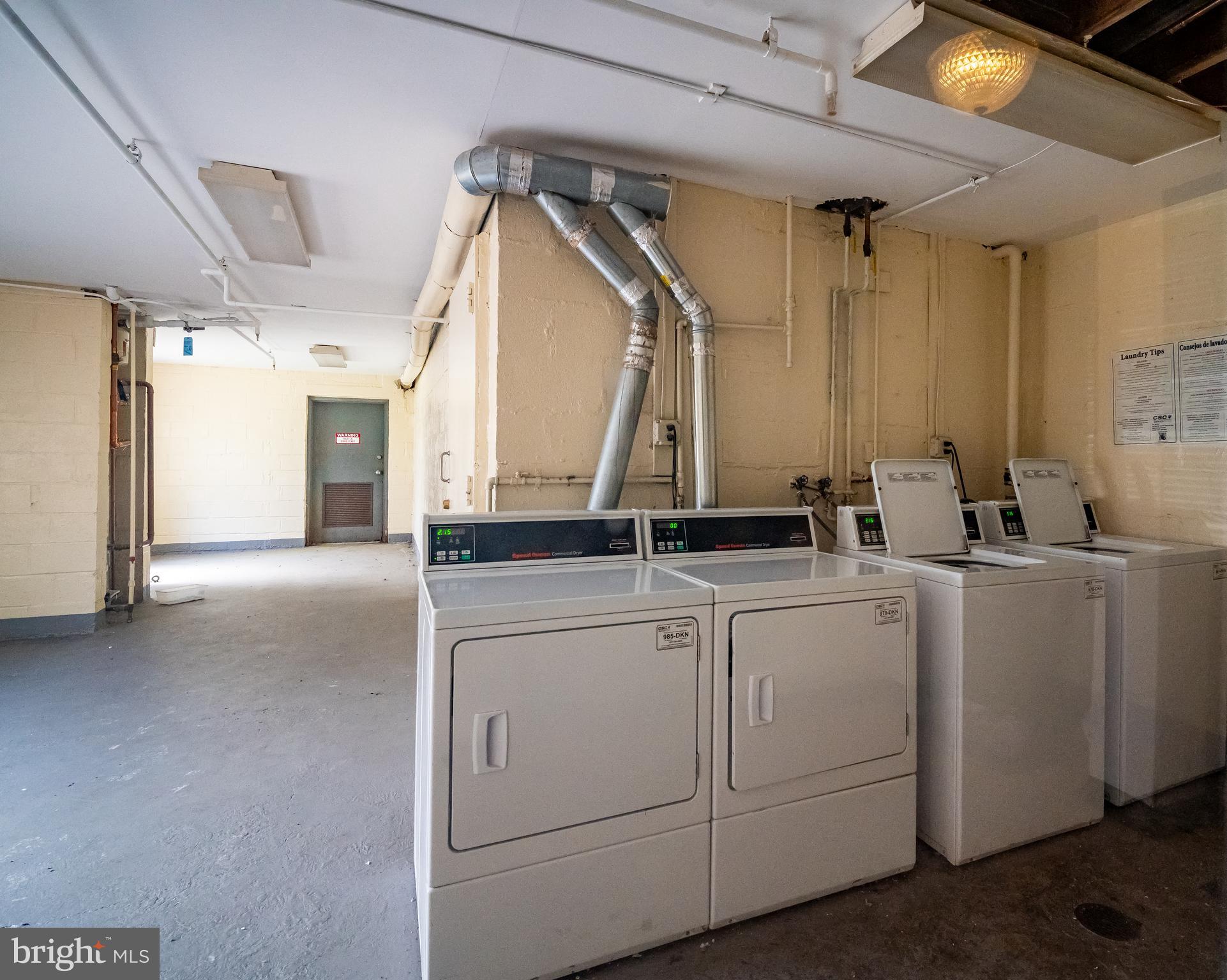 3815 Swann Road, Unit 103 Suitland, MD 20746 - Photo 23 of 23 a view of cabinets and living room