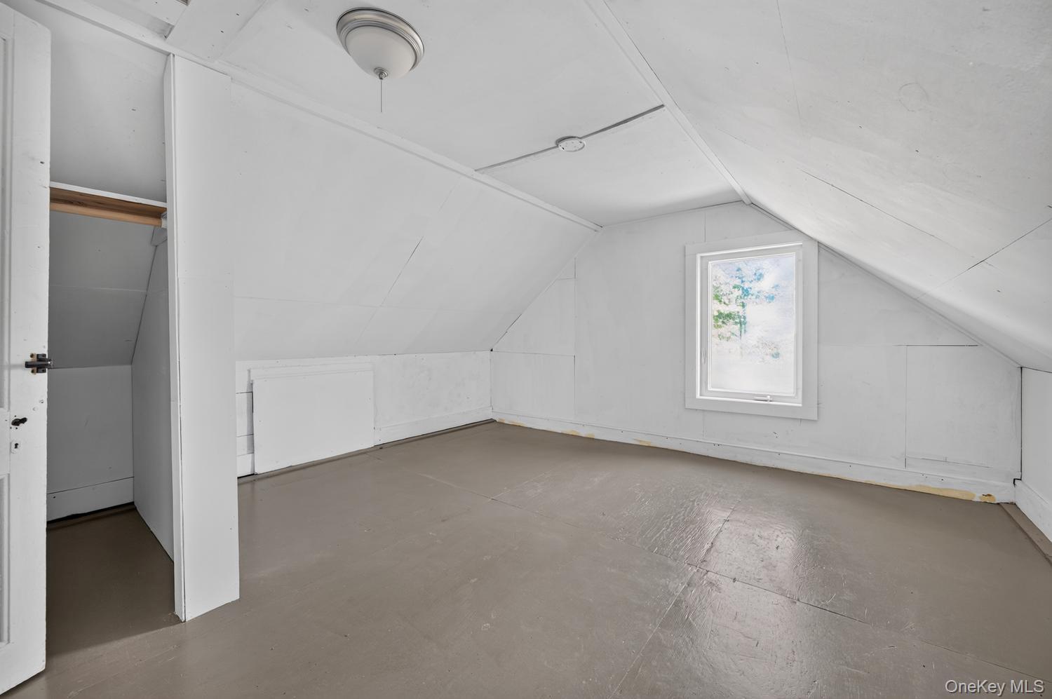 49 Cedar Street Babylon, NY 11702 - Photo 15 of 20 an empty room with windows