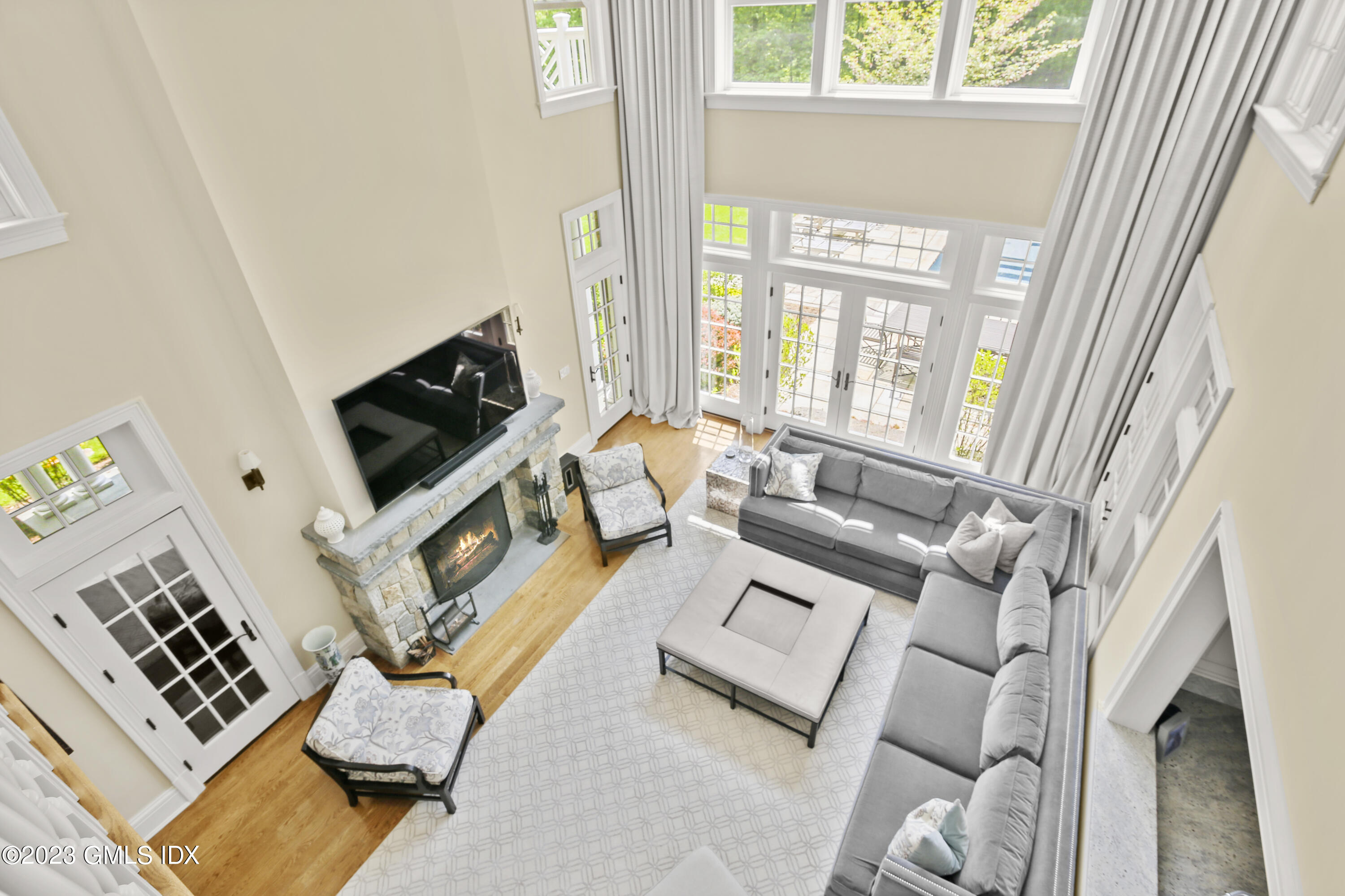 39 Boulder Brook Road Greenwich, CT 06830 - Photo 15 of 55 a living room with furniture and a fireplace