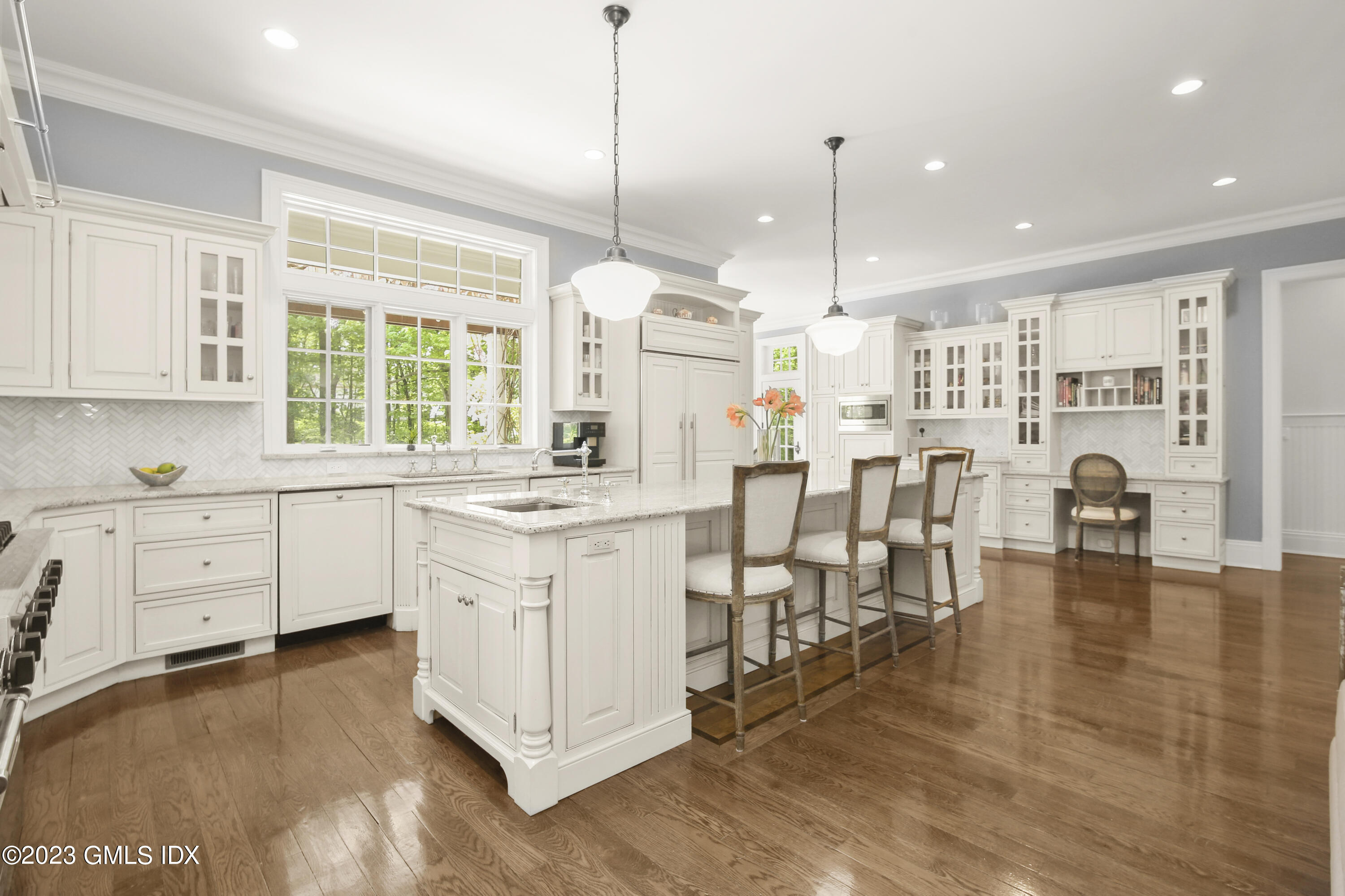 39 Boulder Brook Road Greenwich, CT 06830 - Photo 19 of 55 a kitchen with counter space cabinets and wooden floor