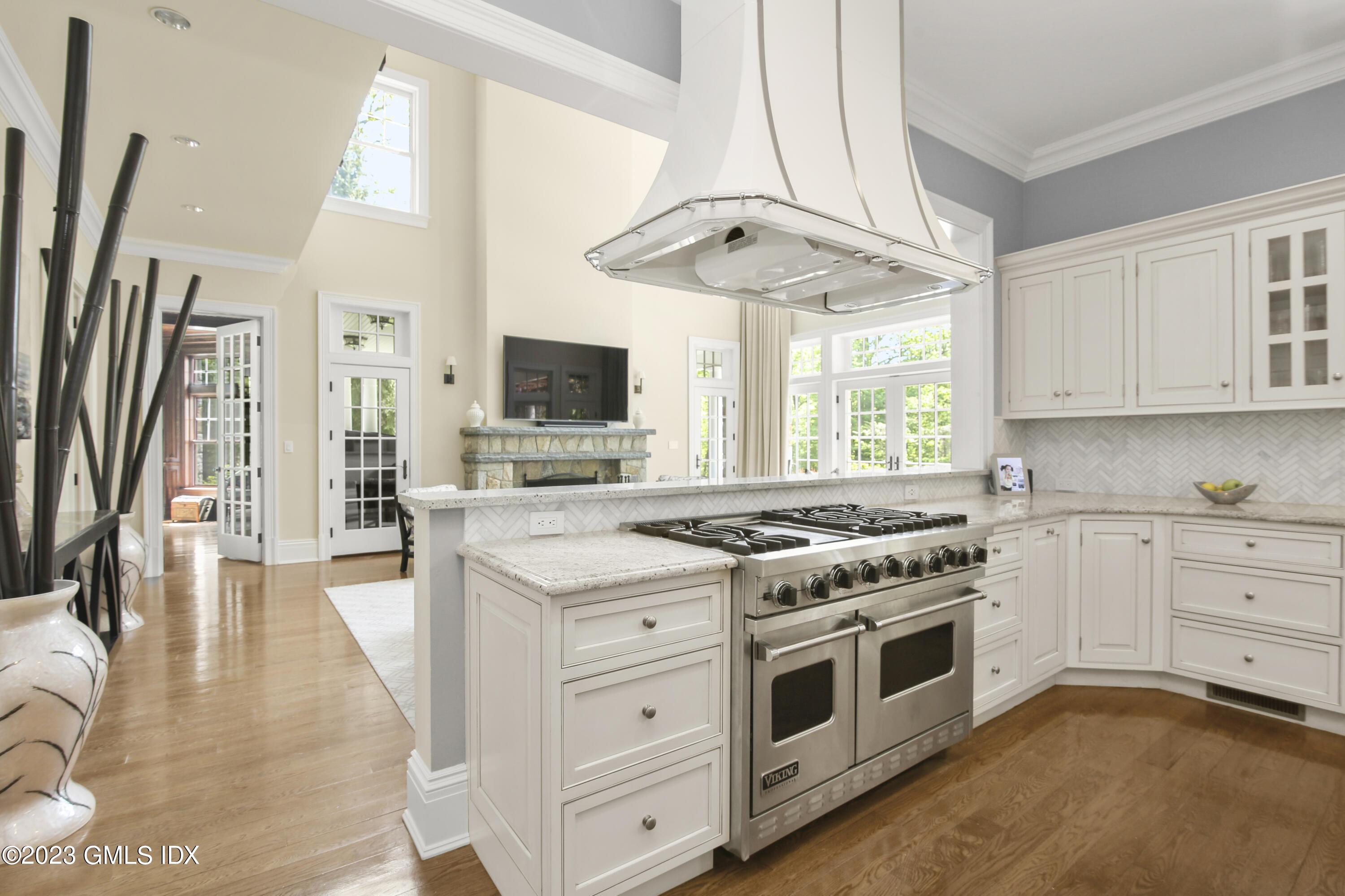 39 Boulder Brook Road Greenwich, CT 06830 - Photo 20 of 55 a kitchen with stainless steel appliances a stove a sink and a refrigerator
