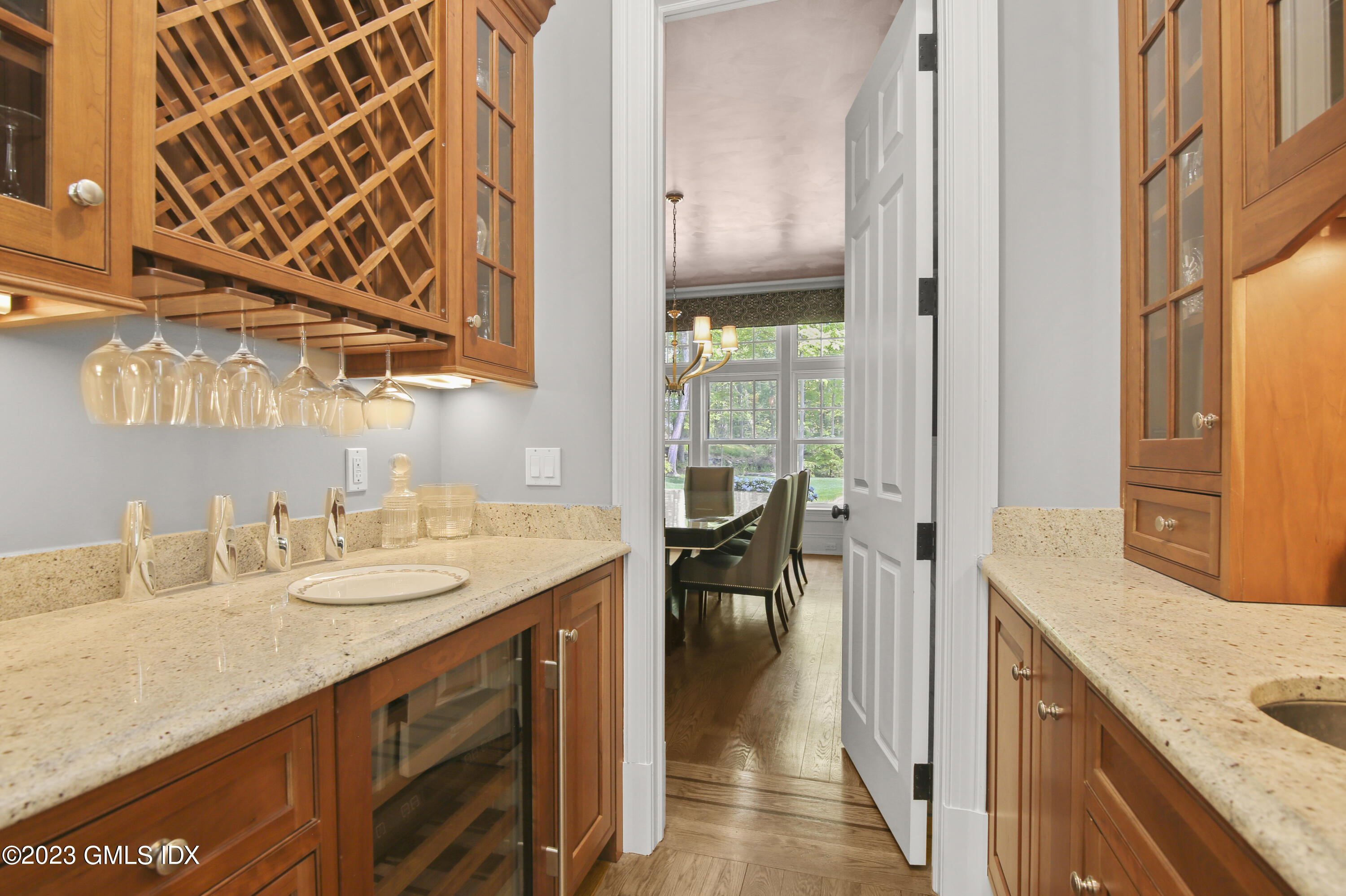 39 Boulder Brook Road Greenwich, CT 06830 - Photo 23 of 55 a bathroom with a granite countertop sink a mirror and a bathtub