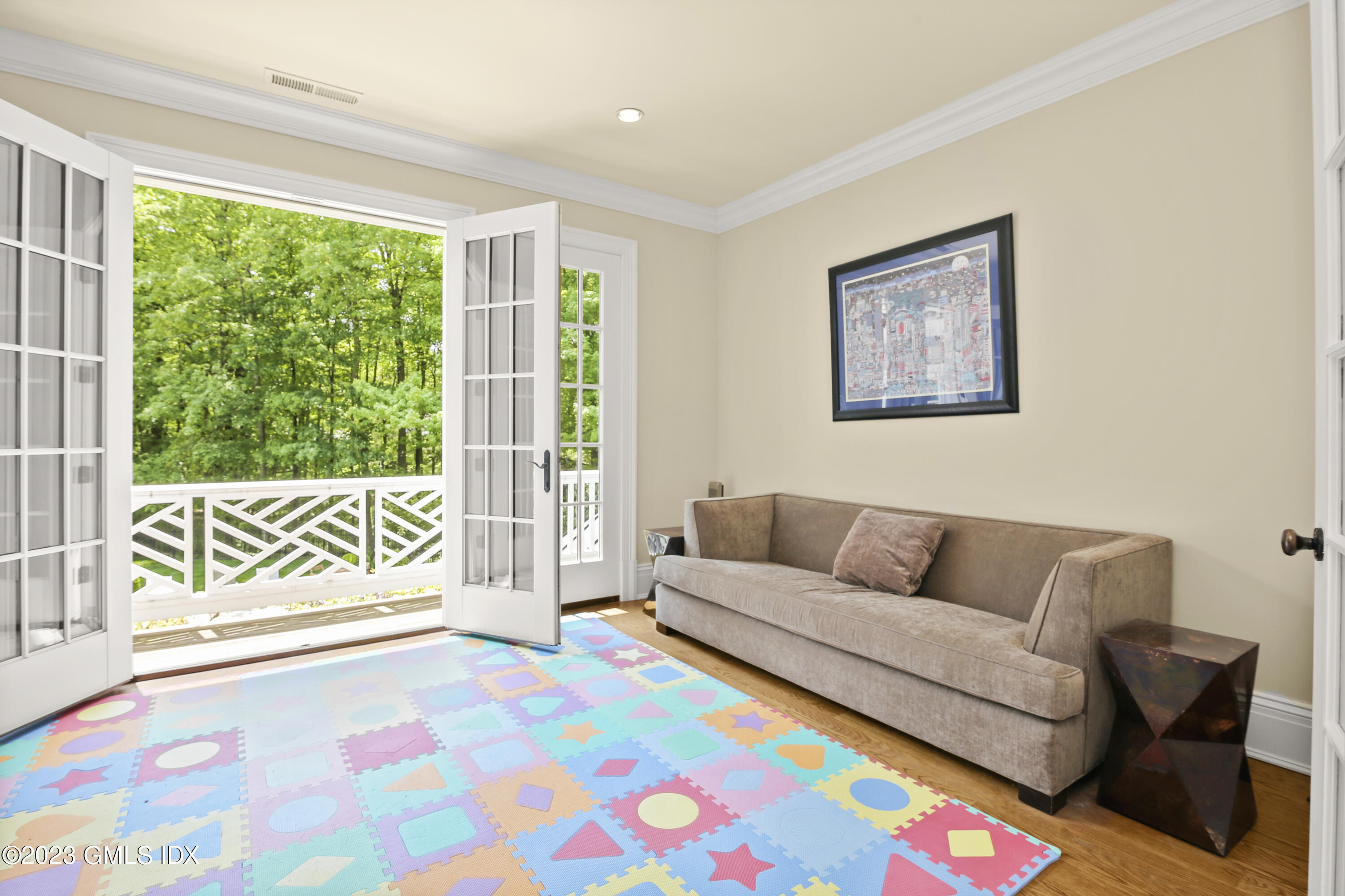 39 Boulder Brook Road Greenwich, CT 06830 - Photo 26 of 55 a living room with furniture and a large window