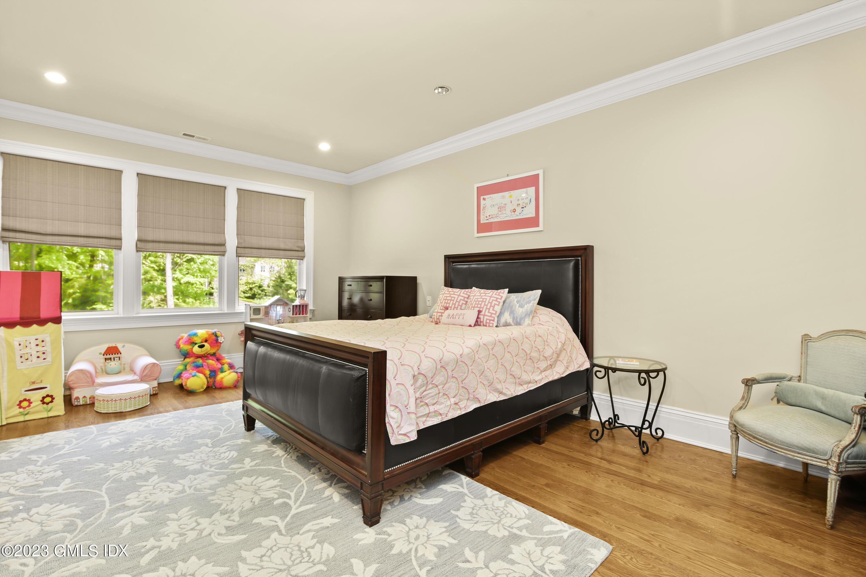 39 Boulder Brook Road Greenwich, CT 06830 - Photo 30 of 55 a bedroom with a bed and a window