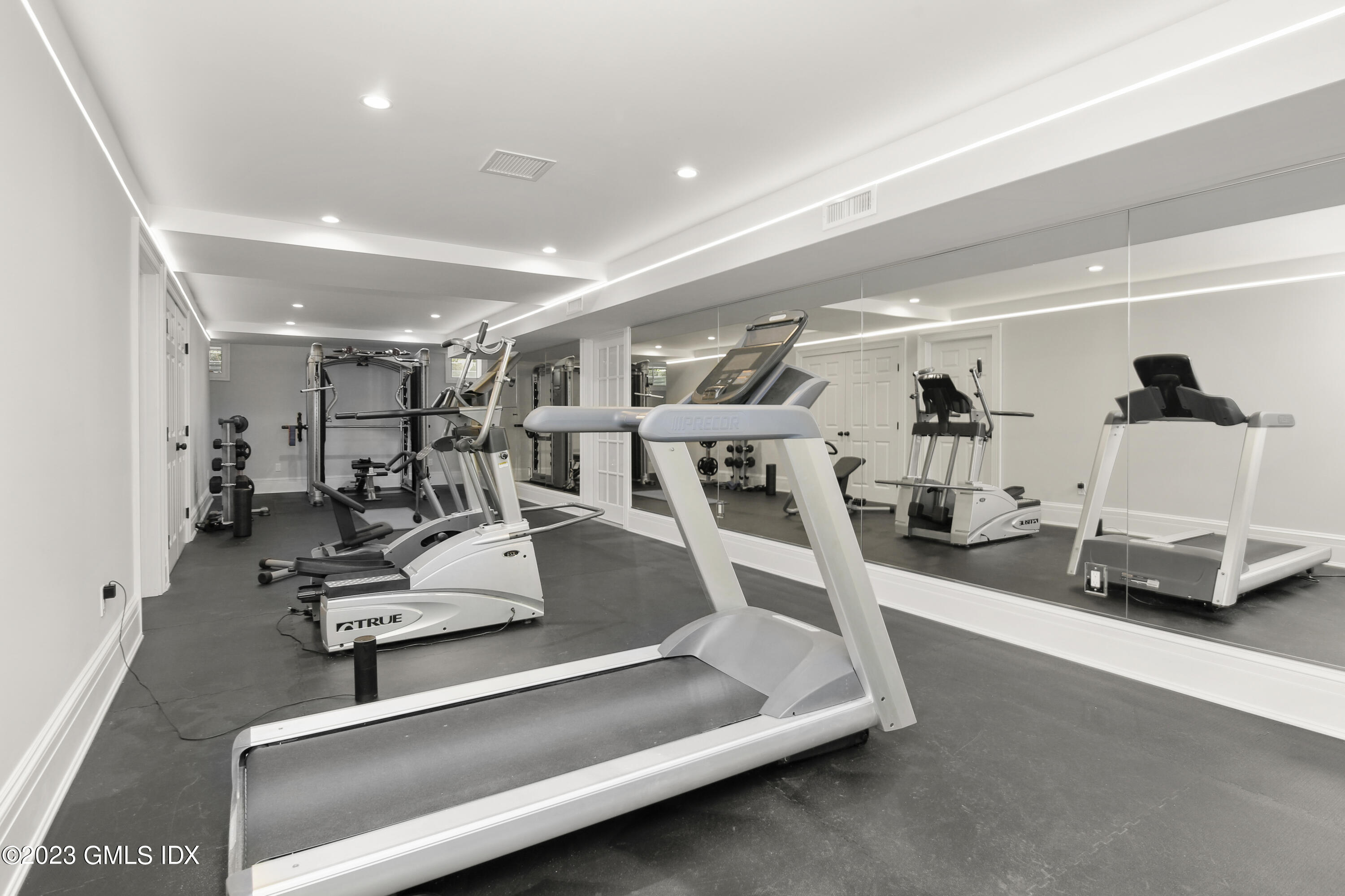 39 Boulder Brook Road Greenwich, CT 06830 - Photo 39 of 55 a view of a room with gym equipment