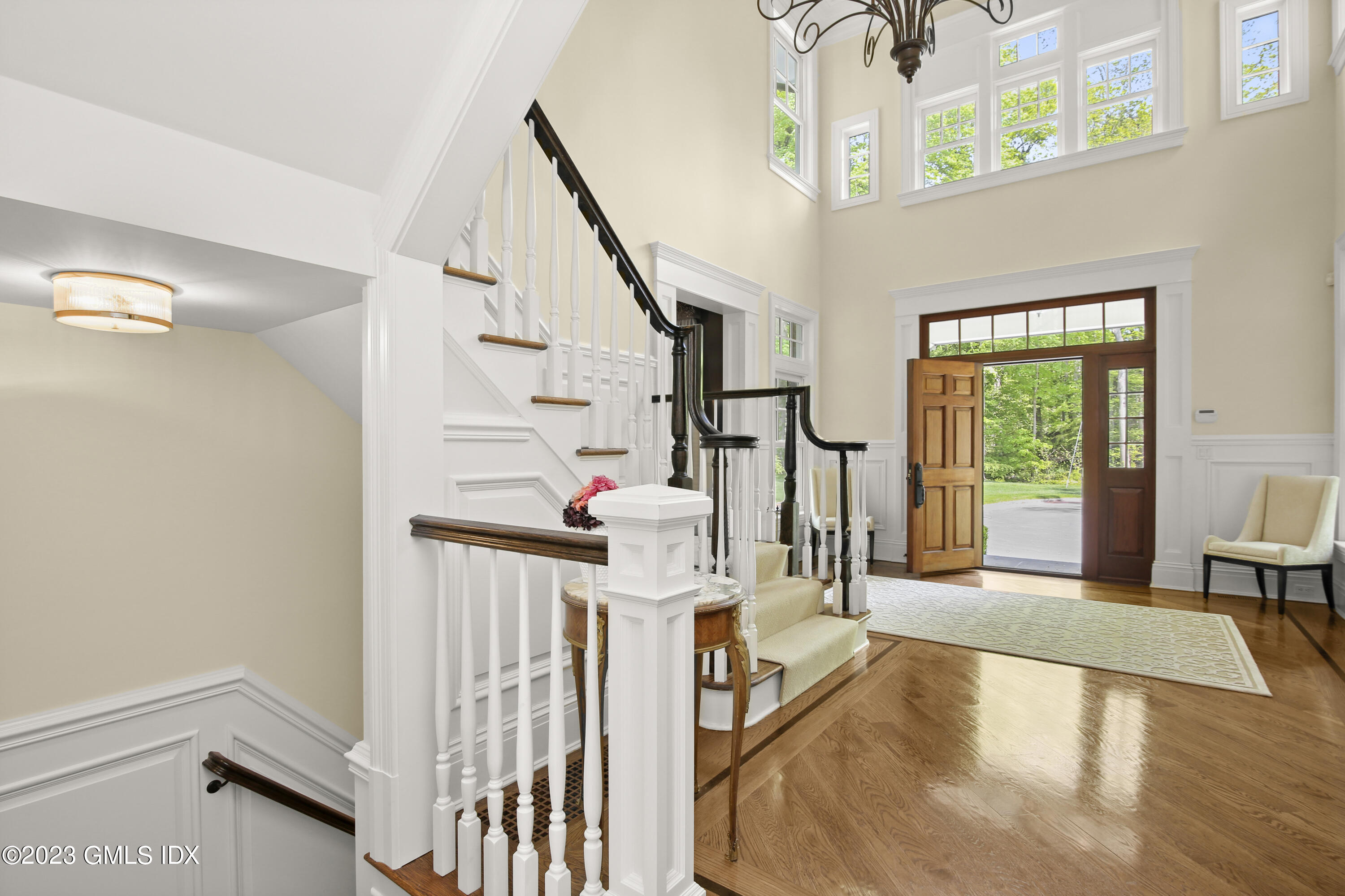 39 Boulder Brook Road Greenwich, CT 06830 - Photo 4 of 55 a view of a livingroom with furniture and staircase
