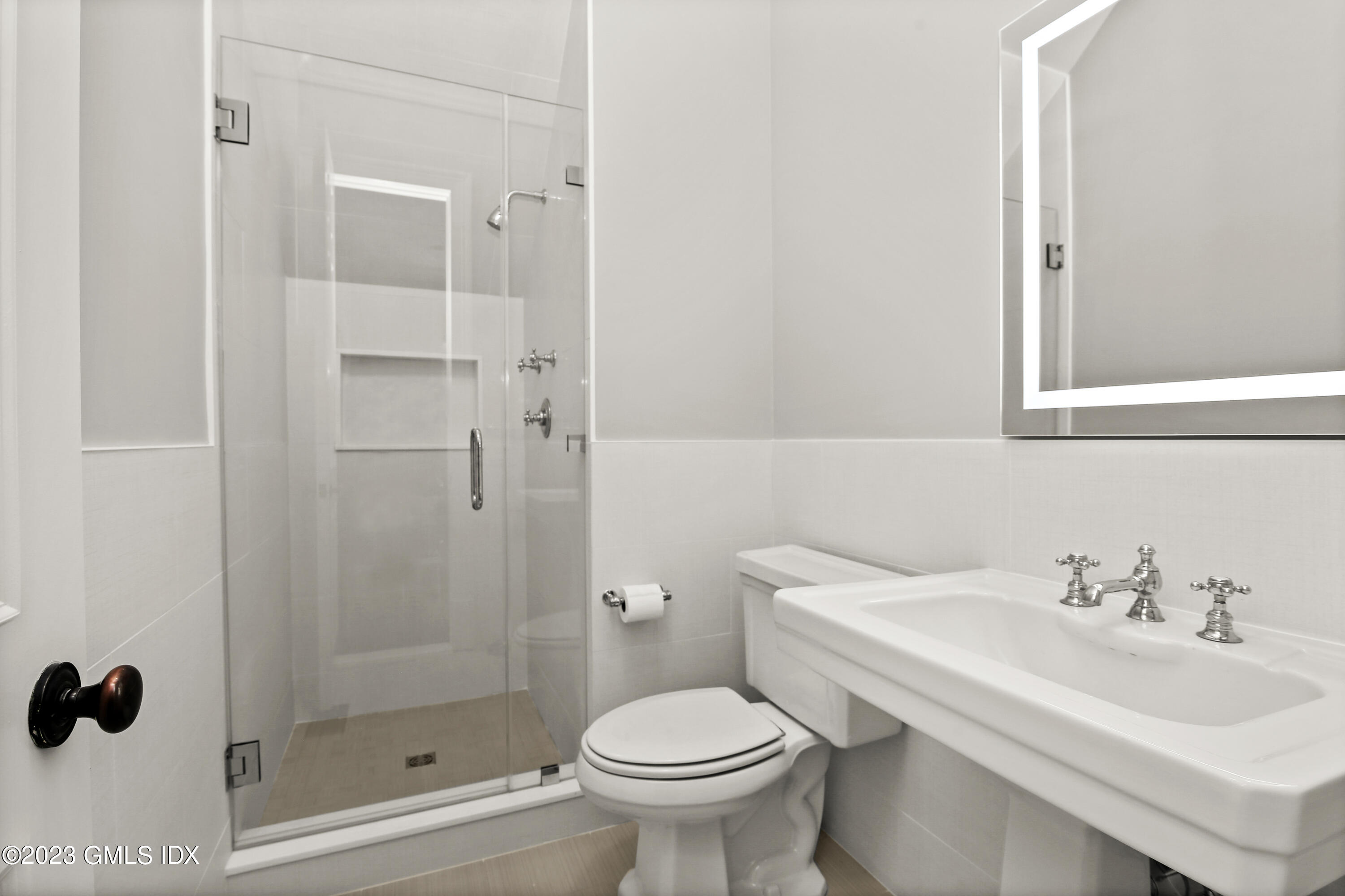 39 Boulder Brook Road Greenwich, CT 06830 - Photo 46 of 55 a bathroom with a sink toilet and shower