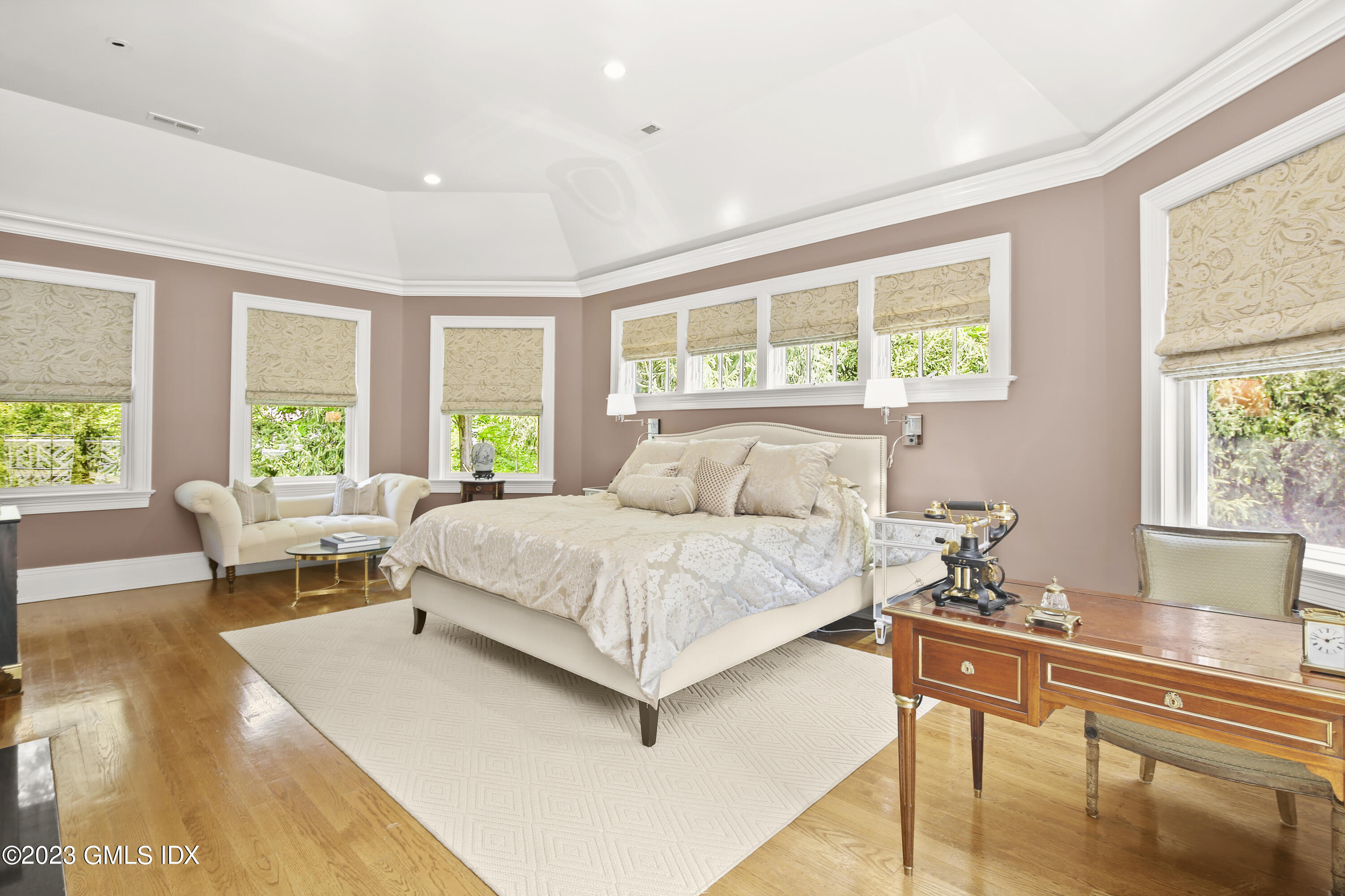 39 Boulder Brook Road Greenwich, CT 06830 - Photo 48 of 55 a spacious bedroom with a large bed and a large window