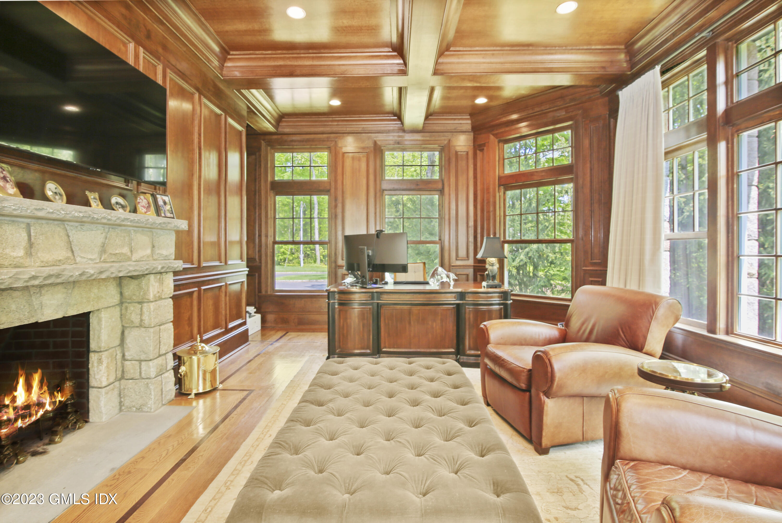 39 Boulder Brook Road Greenwich, CT 06830 - Photo 8 of 55 a living room with furniture fireplace and flat screen tv