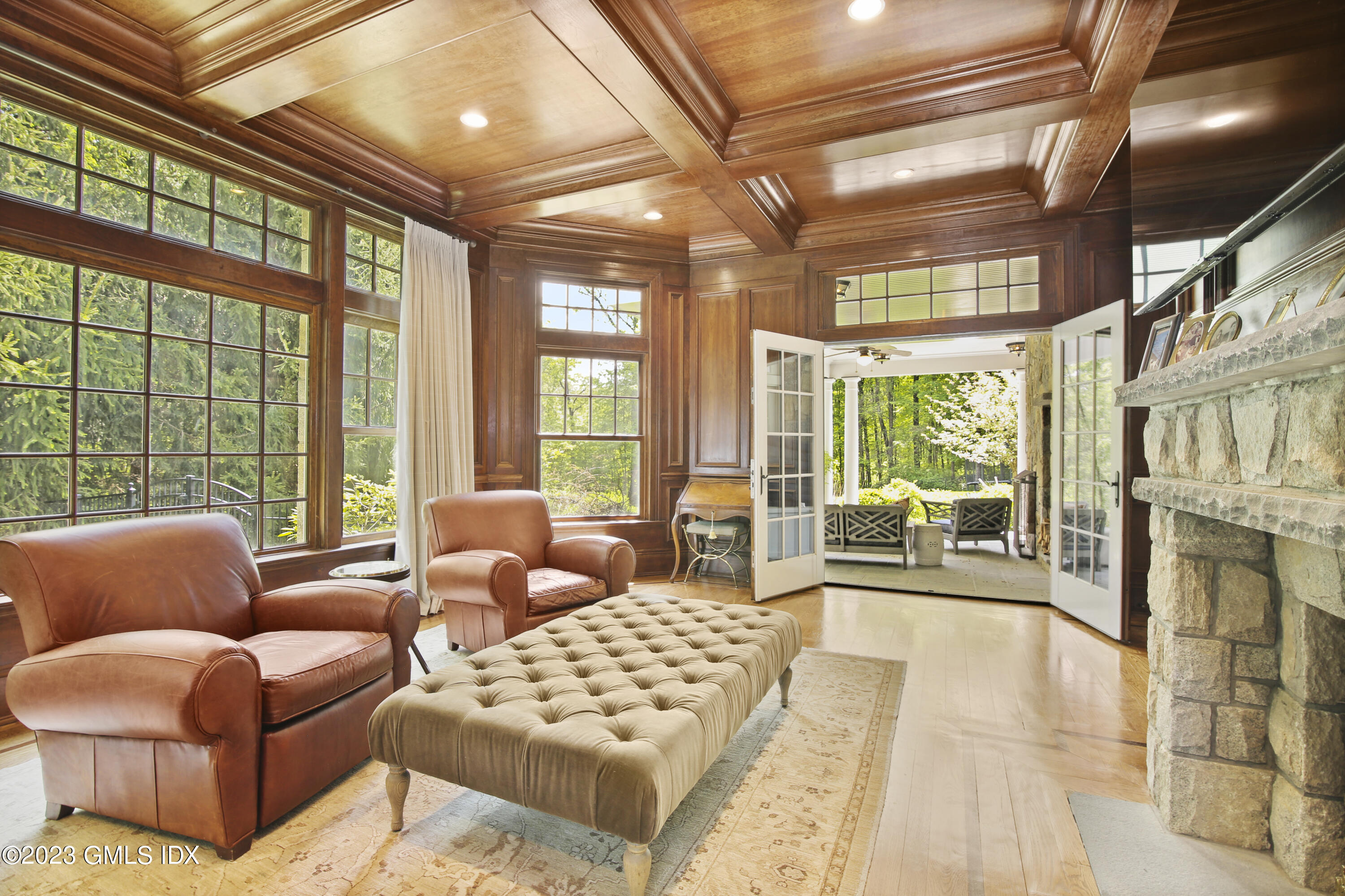 39 Boulder Brook Road Greenwich, CT 06830 - Photo 9 of 55 a living room with furniture and a large window