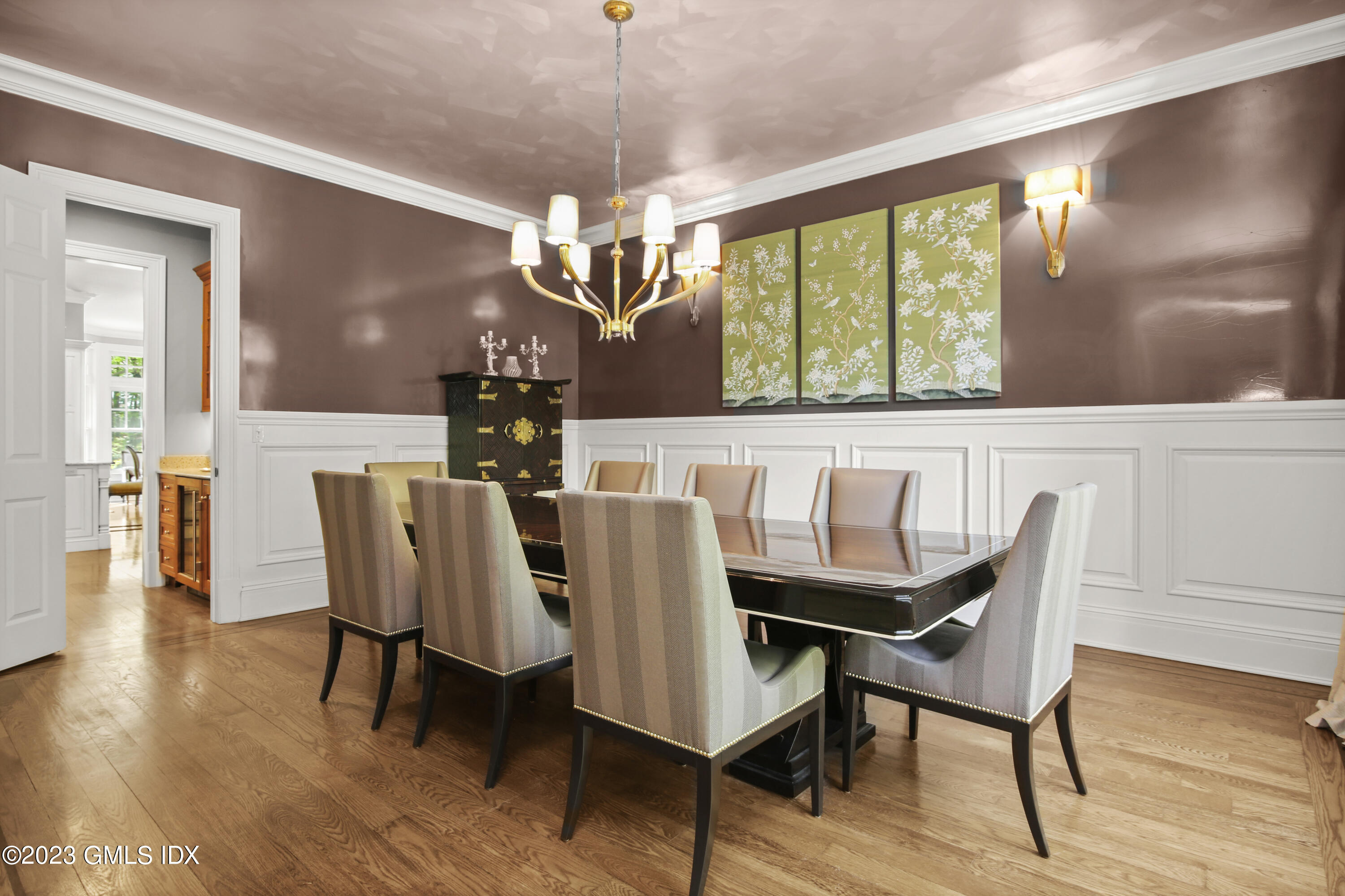 39 Boulder Brook Road Greenwich, CT 06830 - Photo 10 of 55 a view of a dining room with furniture wooden floor and chandelier