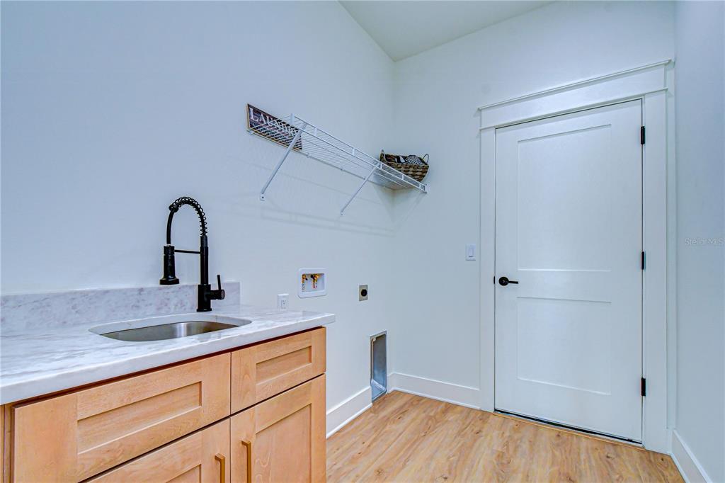 3213 West Aileen Street Tampa, FL 33607 - Photo 30 of 31 a close view of a sink and tap