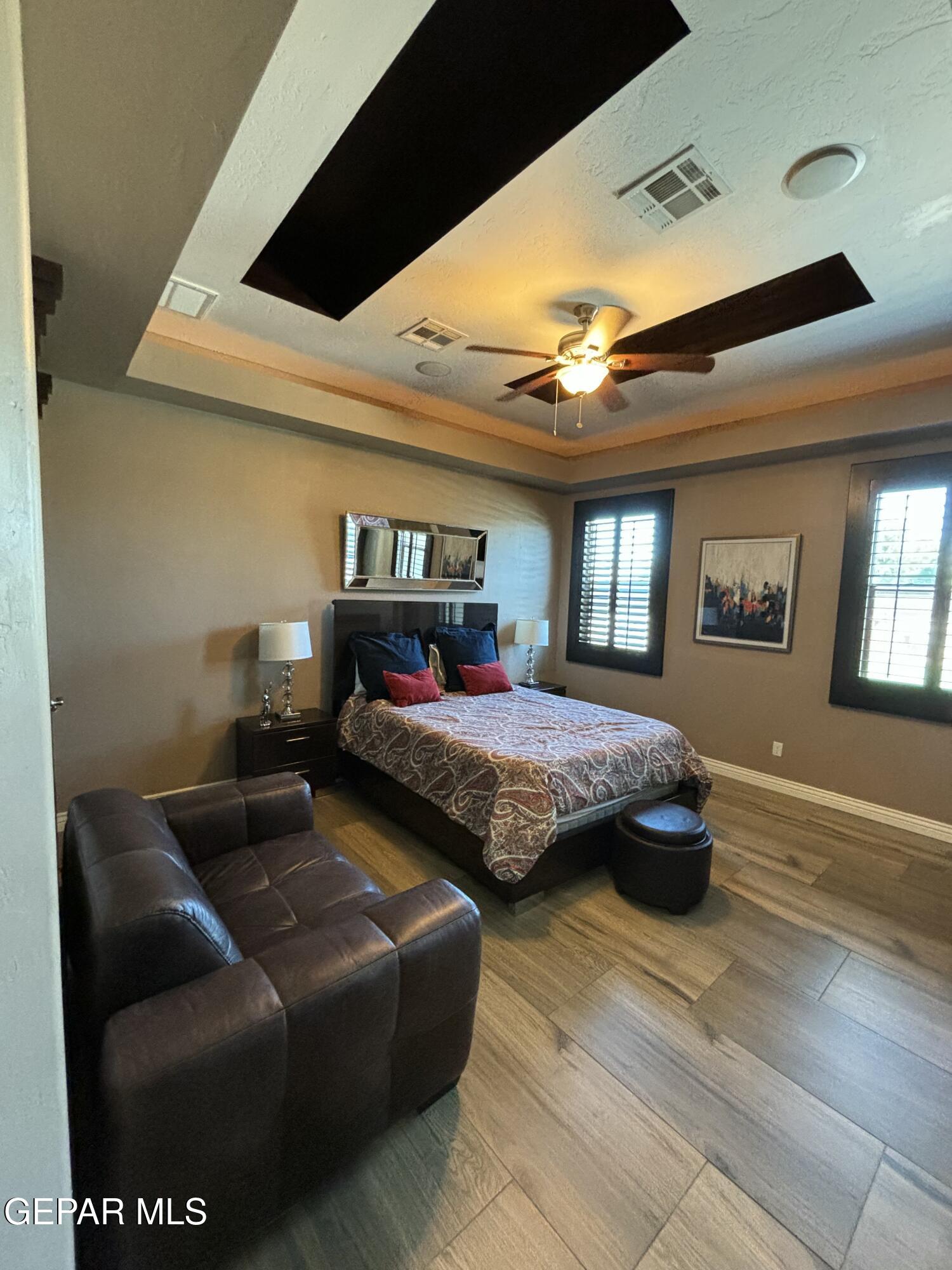 317 Rio Del Rancho Court El Paso, TX 79932 - Photo 16 of 25 a bedroom with bed and window