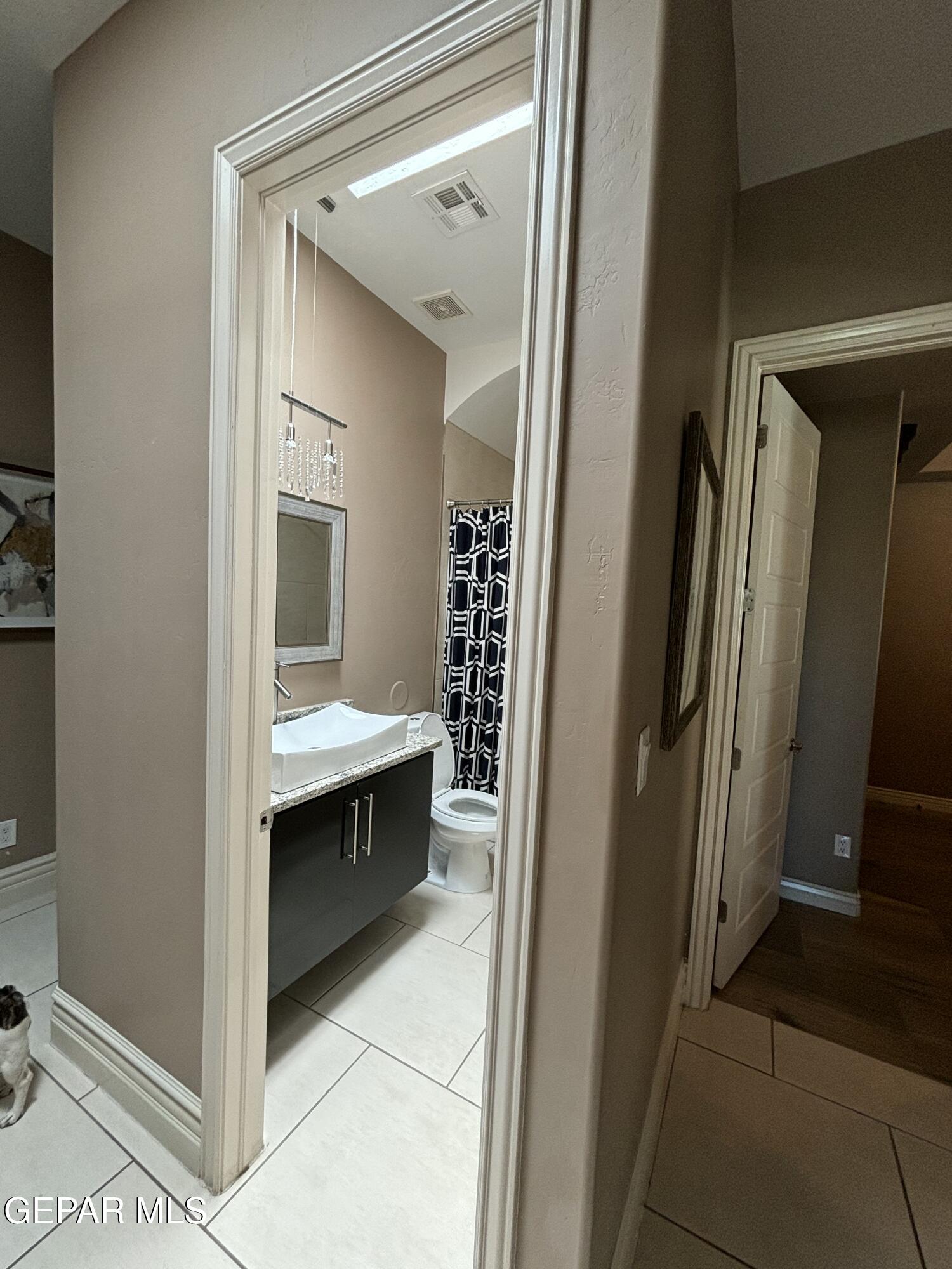317 Rio Del Rancho Court El Paso, TX 79932 - Photo 19 of 25 a view of bathroom with a sink and mirror