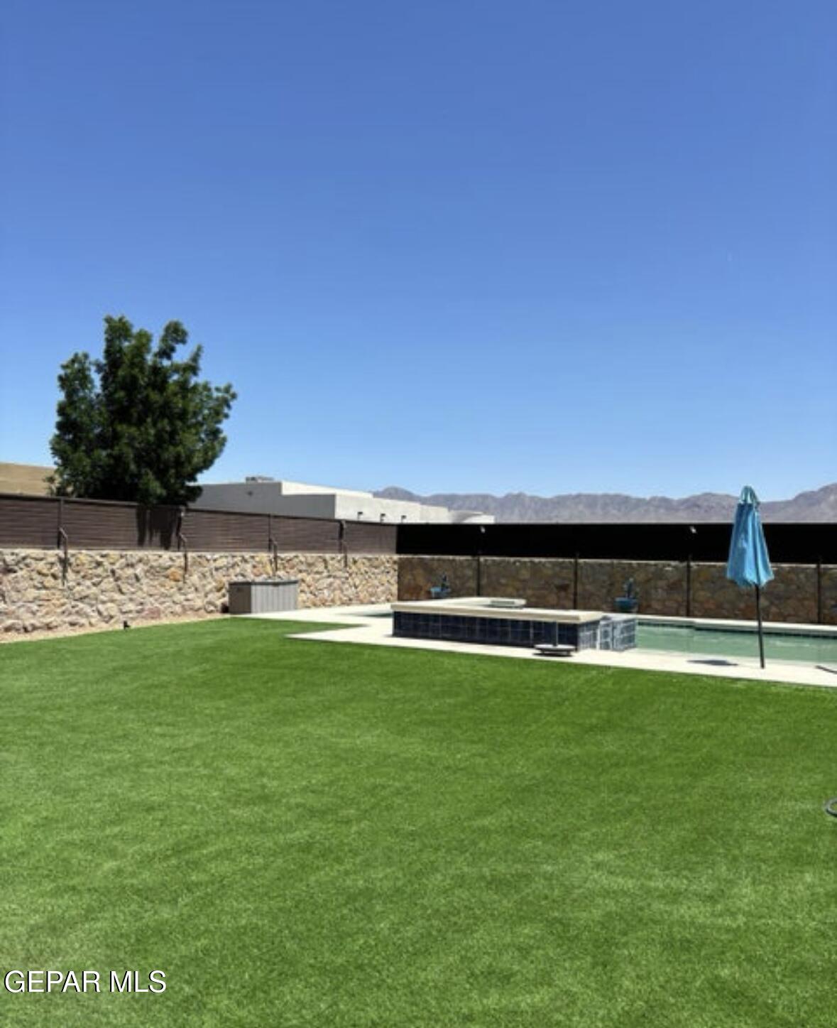 317 Rio Del Rancho Court El Paso, TX 79932 - Photo 22 of 25 a view of a back yard