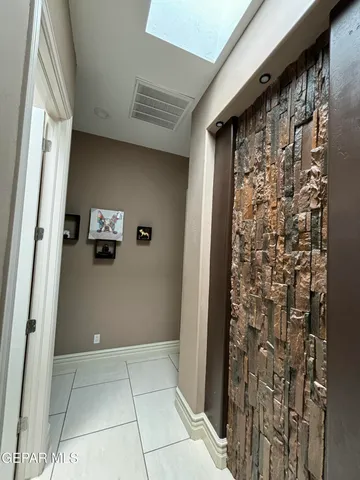 a view of bathroom with a shower and a sink