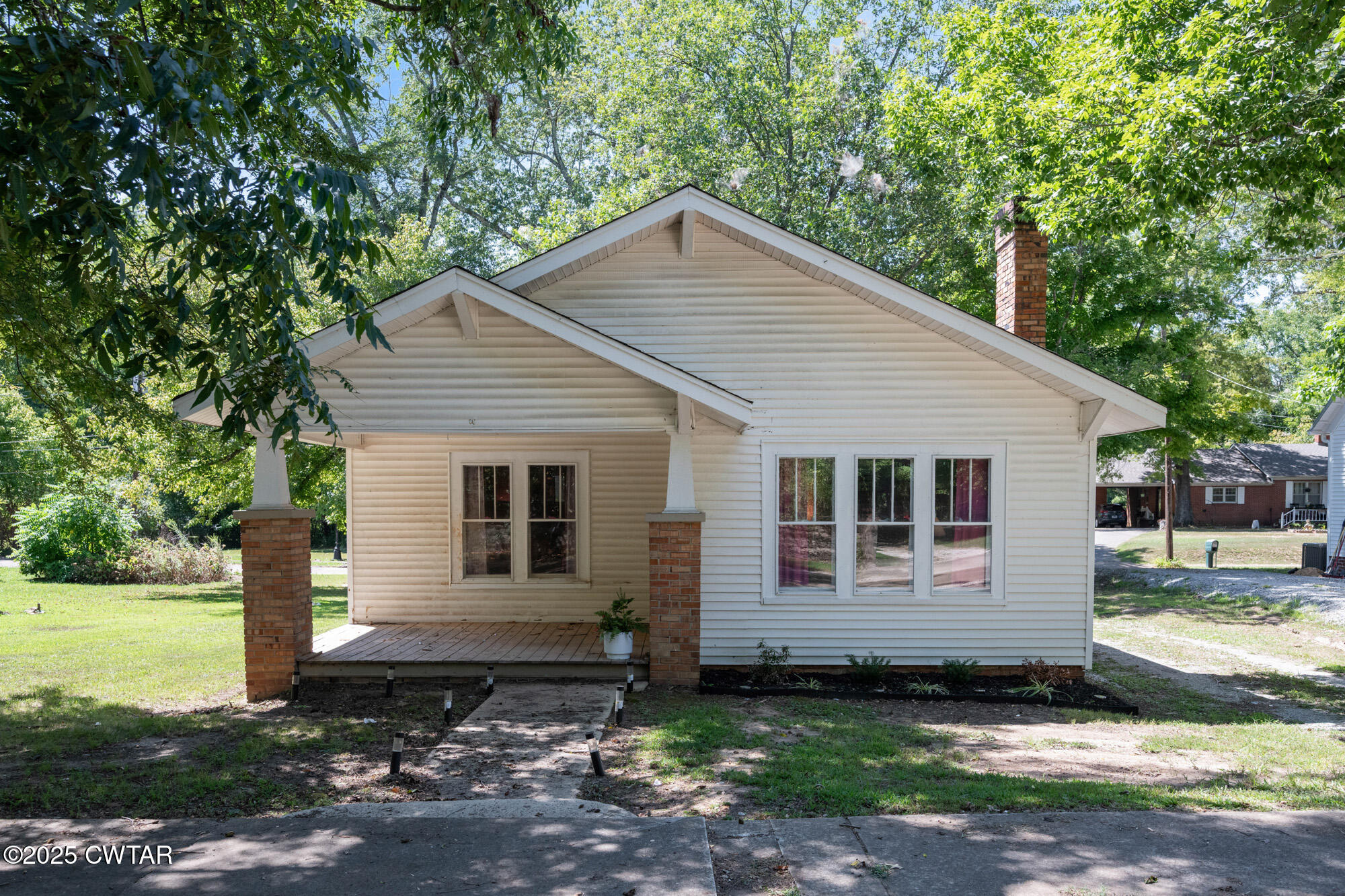 13185 Paris Street Huntingdon, TN 38344 - Photo 14 of 14 a view of a house with a yard