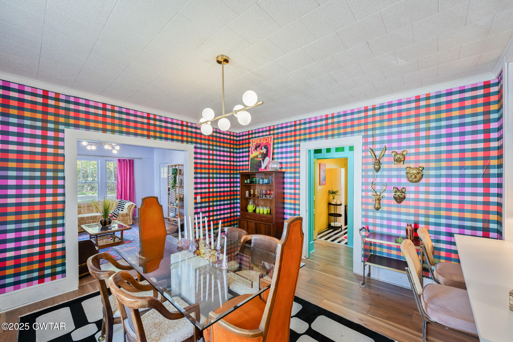 13185 Paris Street Huntingdon, TN 38344 - Photo 5 of 14 a view of a dining room with furniture and chandelier