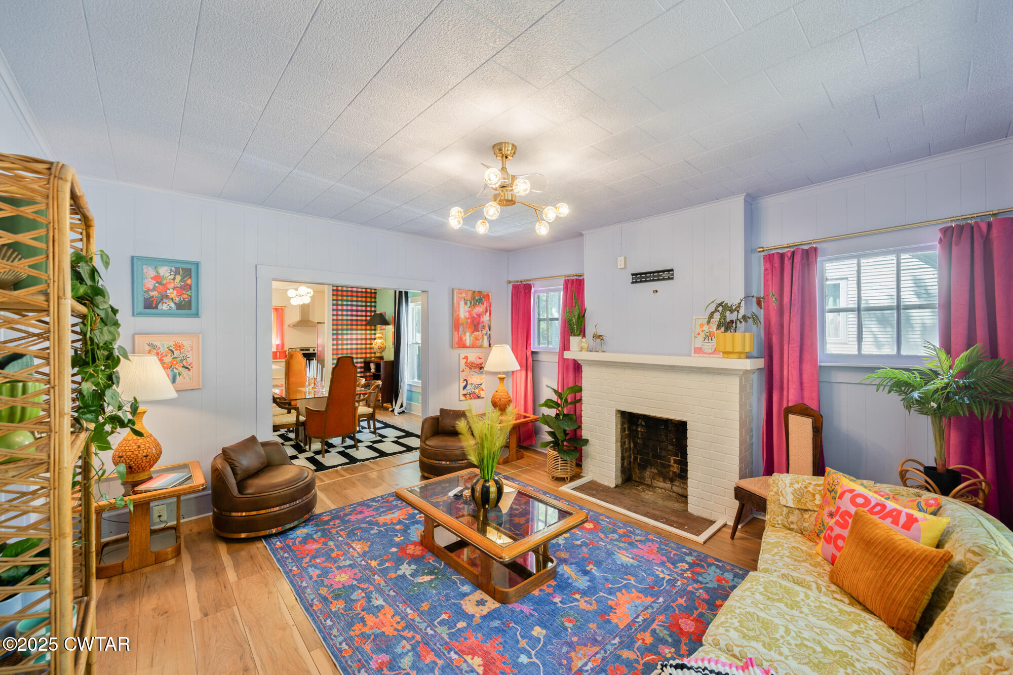 13185 Paris Street Huntingdon, TN 38344 - Photo 7 of 14 a living room with furniture fireplace and window