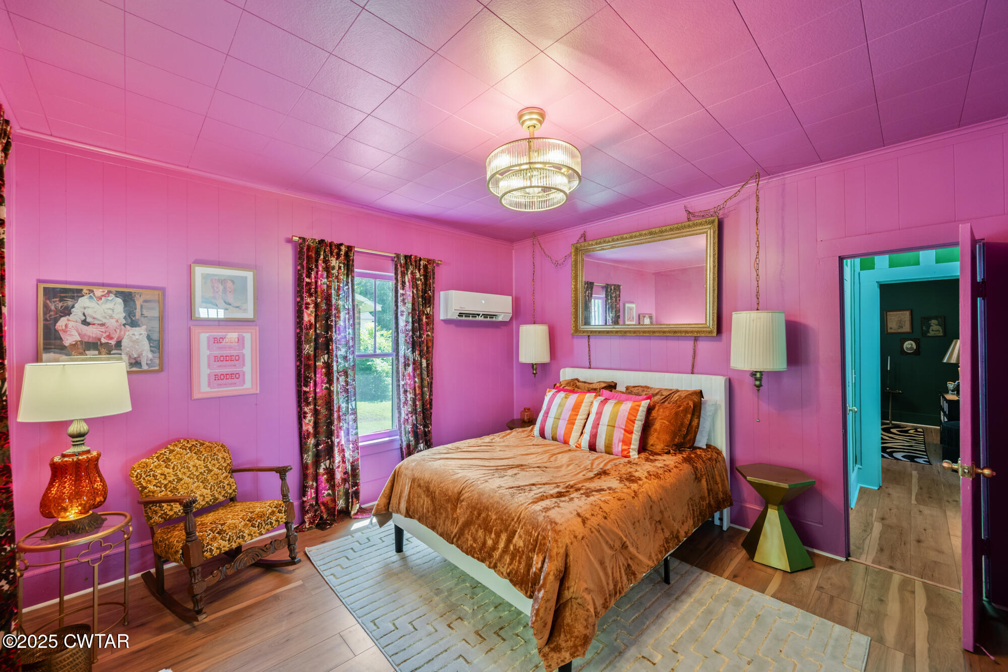 13185 Paris Street Huntingdon, TN 38344 - Photo 10 of 14 a bedroom with a bed dresser and a window