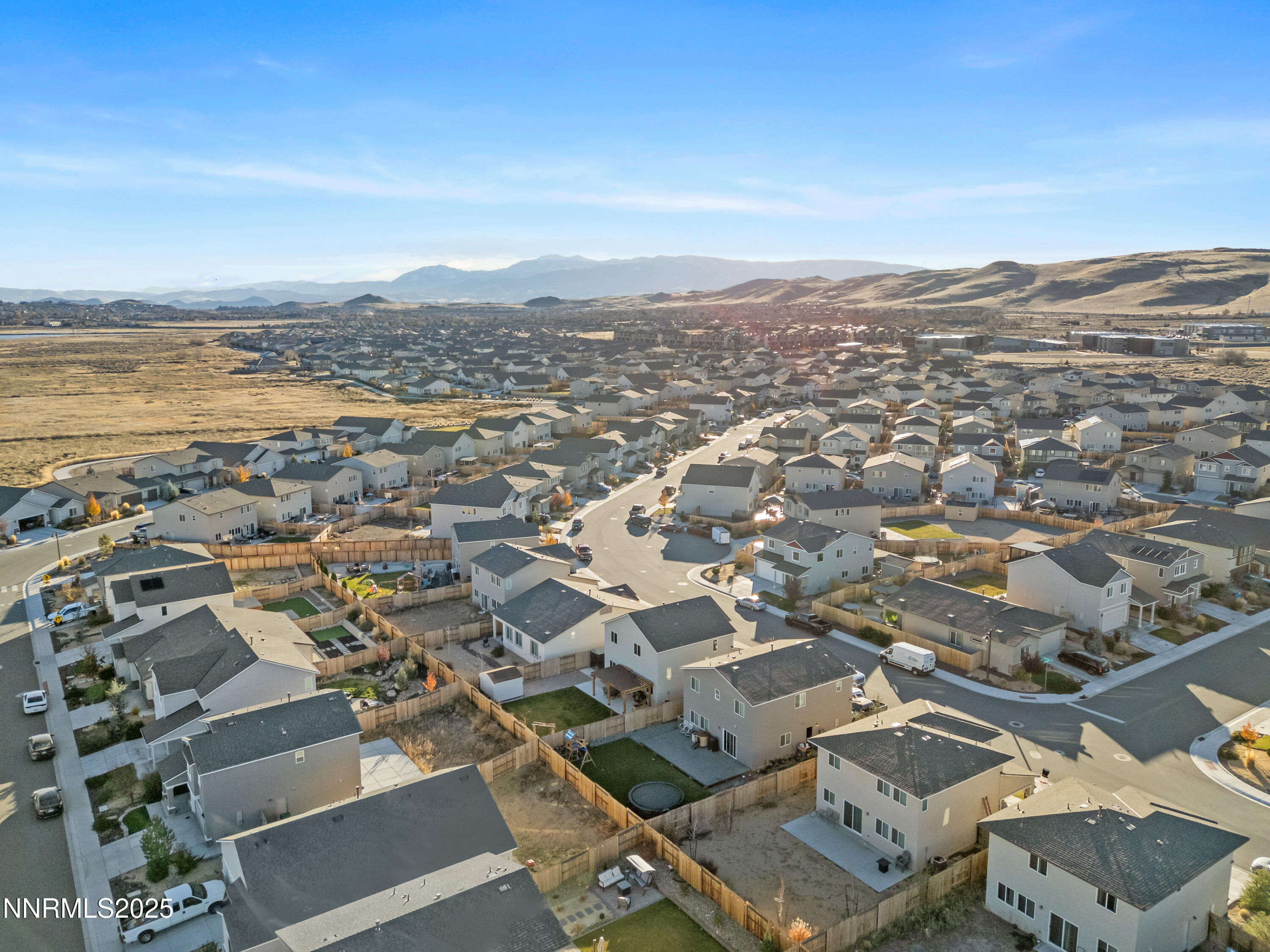 1383 Old Barn Road Sparks, NV 89436 - Photo 12 of 44 an aerial view of residential building with ocean view