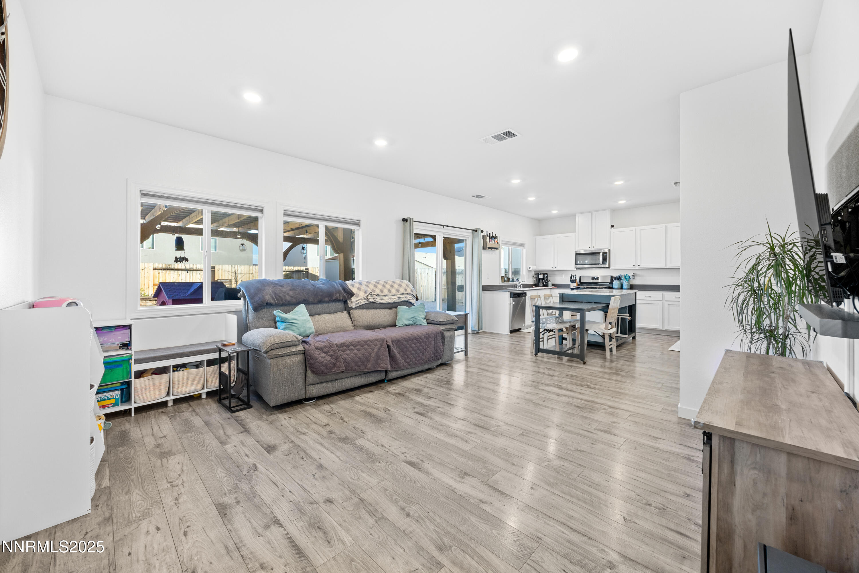 1383 Old Barn Road Sparks, NV 89436 - Photo 20 of 44 a living room with furniture and a flat screen tv