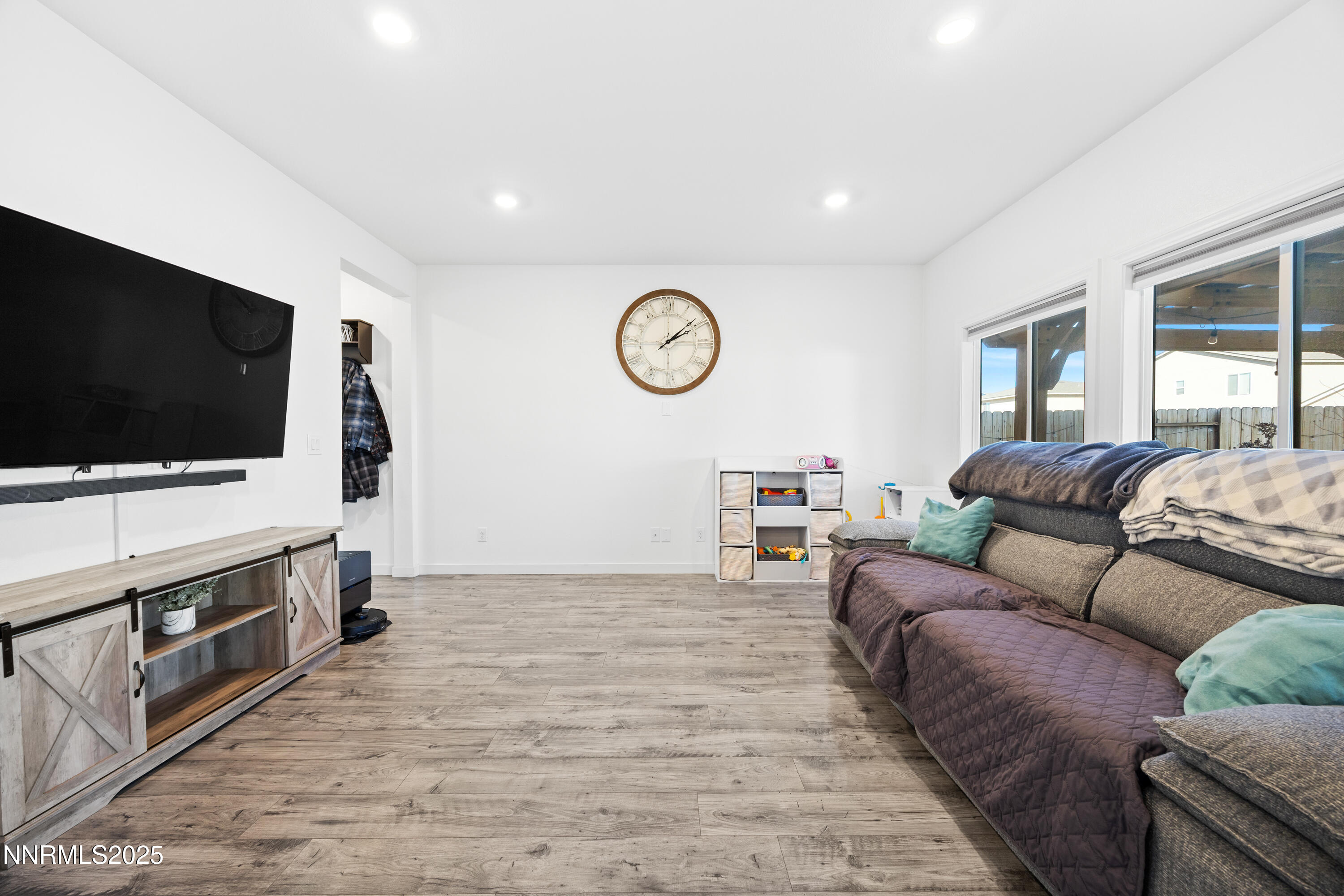 1383 Old Barn Road Sparks, NV 89436 - Photo 22 of 44 a living room with furniture and a flat screen tv