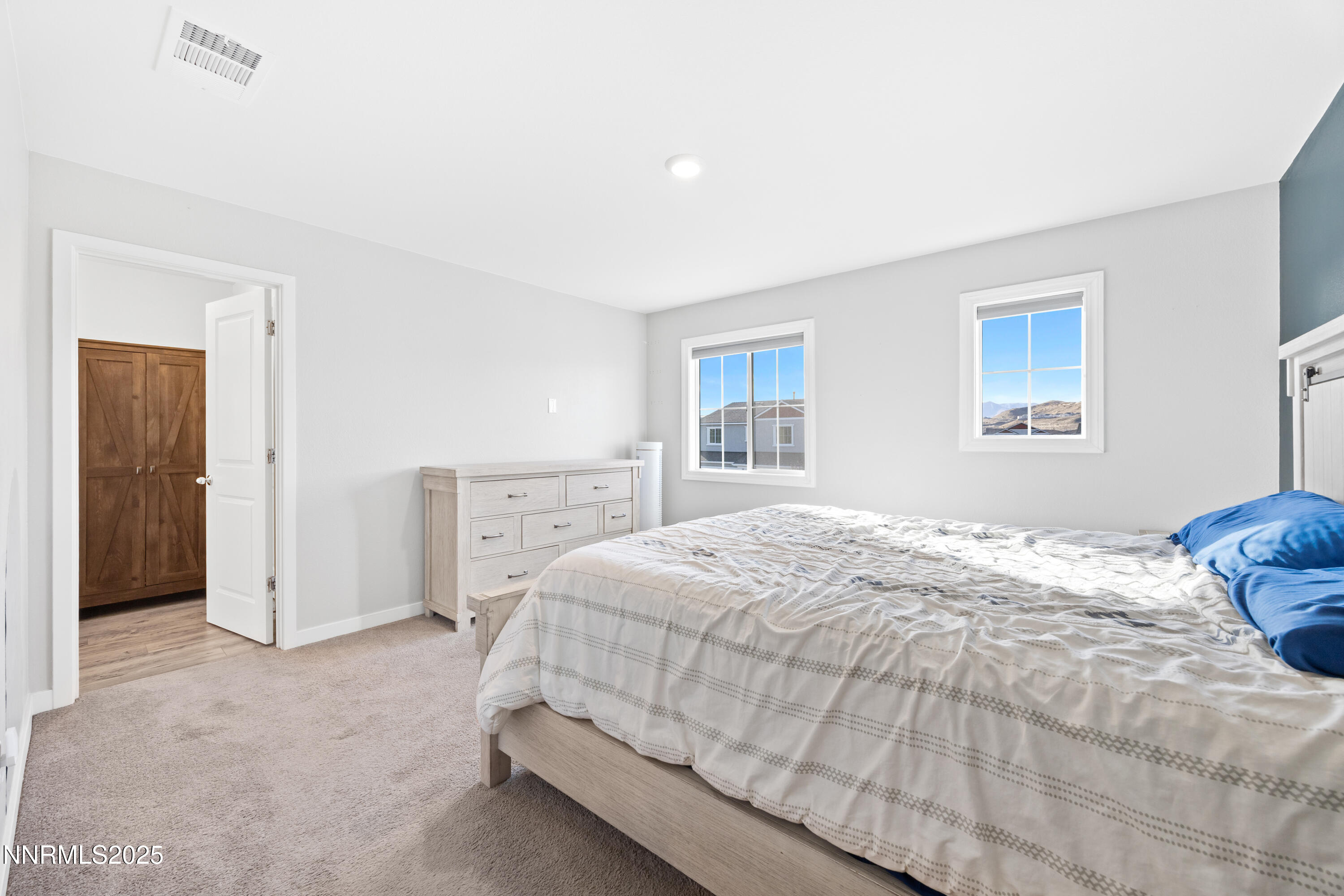 1383 Old Barn Road Sparks, NV 89436 - Photo 29 of 44 a bedroom with a bed and a window