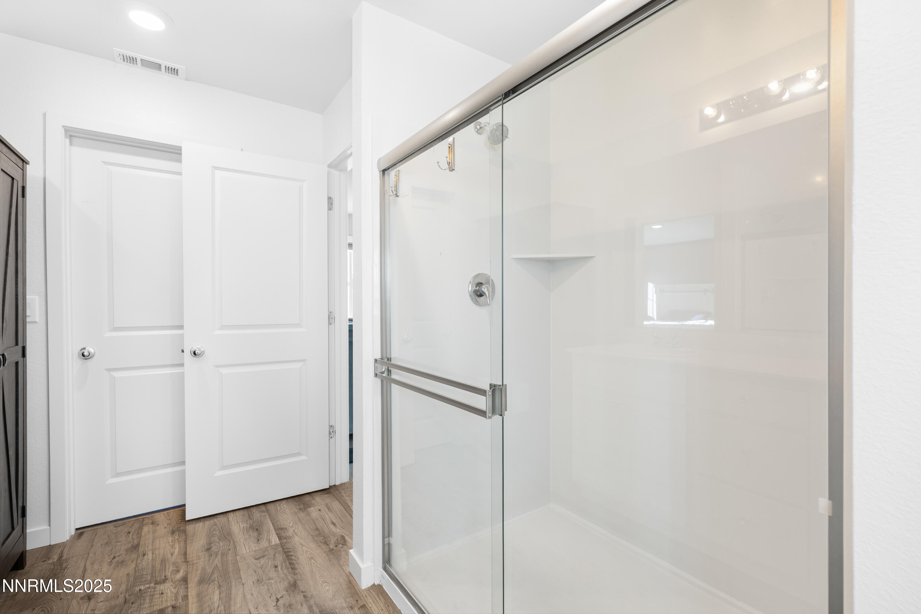 1383 Old Barn Road Sparks, NV 89436 - Photo 33 of 44 a bathroom with a shower and a glass door