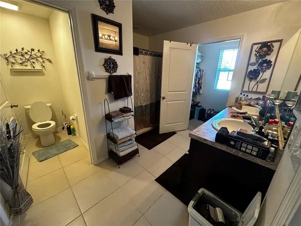 a room with lots of furniture and mirrors