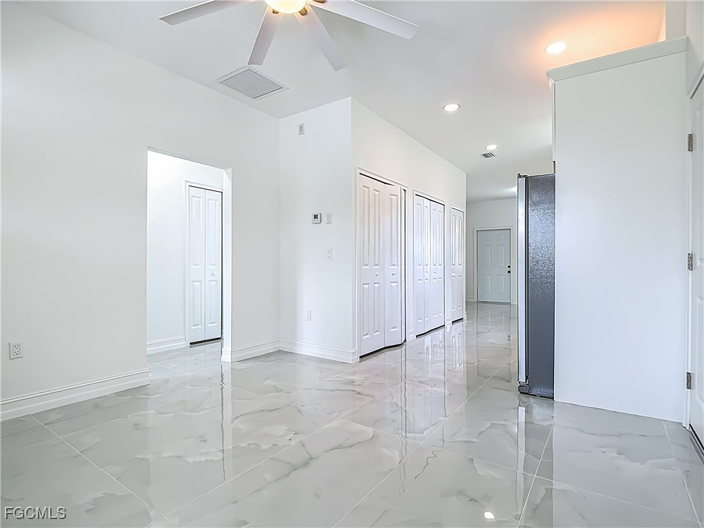 3705 8th Street Southwest Lehigh Acres, FL 33976 - Photo 5 of 34 a view of an empty room