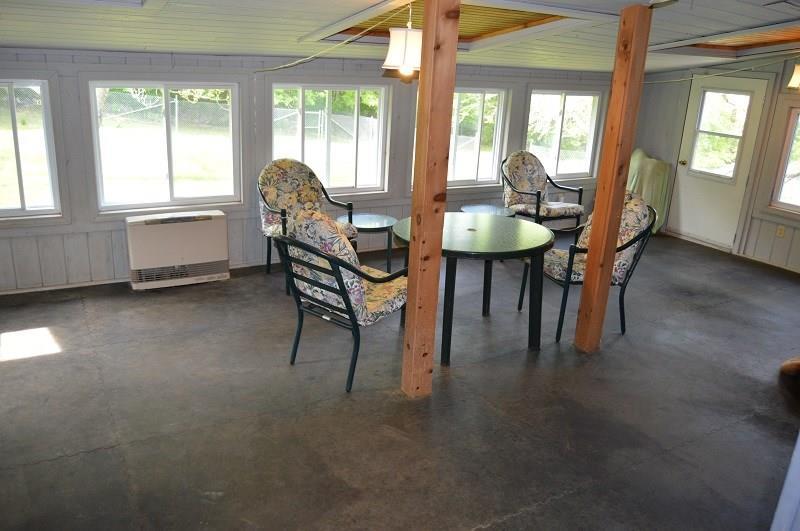 505 Stickney Hill Road Brownville, ME 04414 - Photo 14 of 30 Sunroom