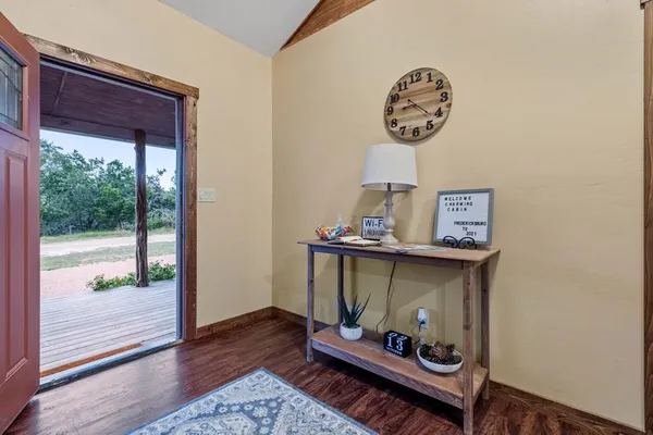 a room with furniture and wooden floor