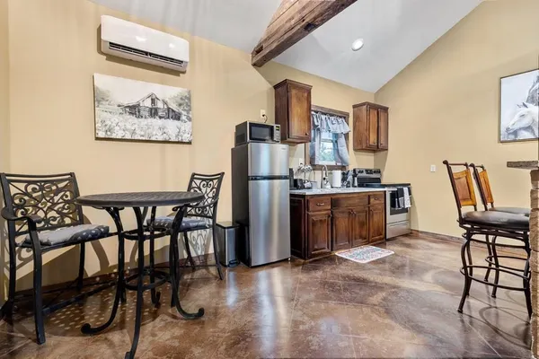 a view of a dining room with furniture