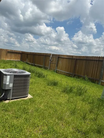 a view of a backyard with a garden