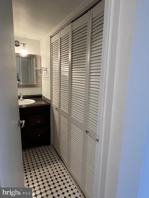 922 24th Street Northwest, Unit 718 Washington, DC 20037 - Photo 14 of 28 a bathroom with a sink a toilet and shower