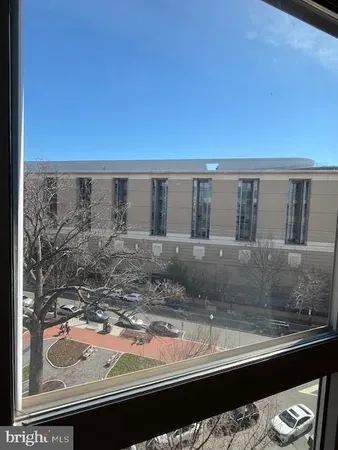 a view of swimming pool from a window
