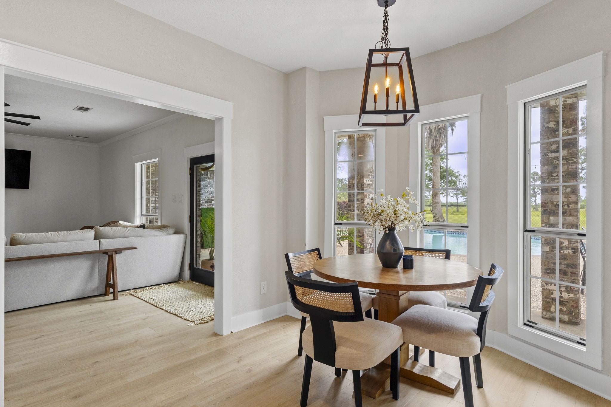 16421 Westbury Road Beaumont, TX 77713 - Photo 9 of 29 a dining room with furniture window and wooden floor