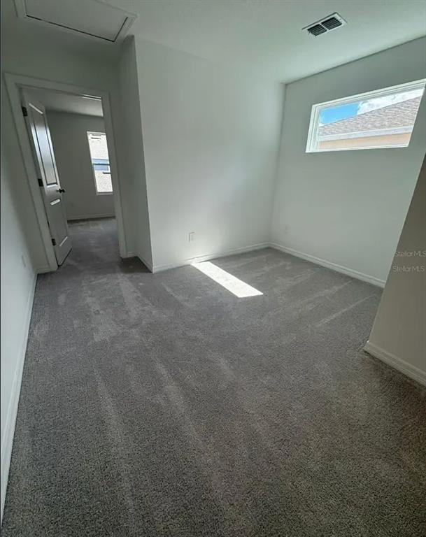 15074 Windflower Alley Winter Garden, FL 34787 - Photo 7 of 18 a view of empty room