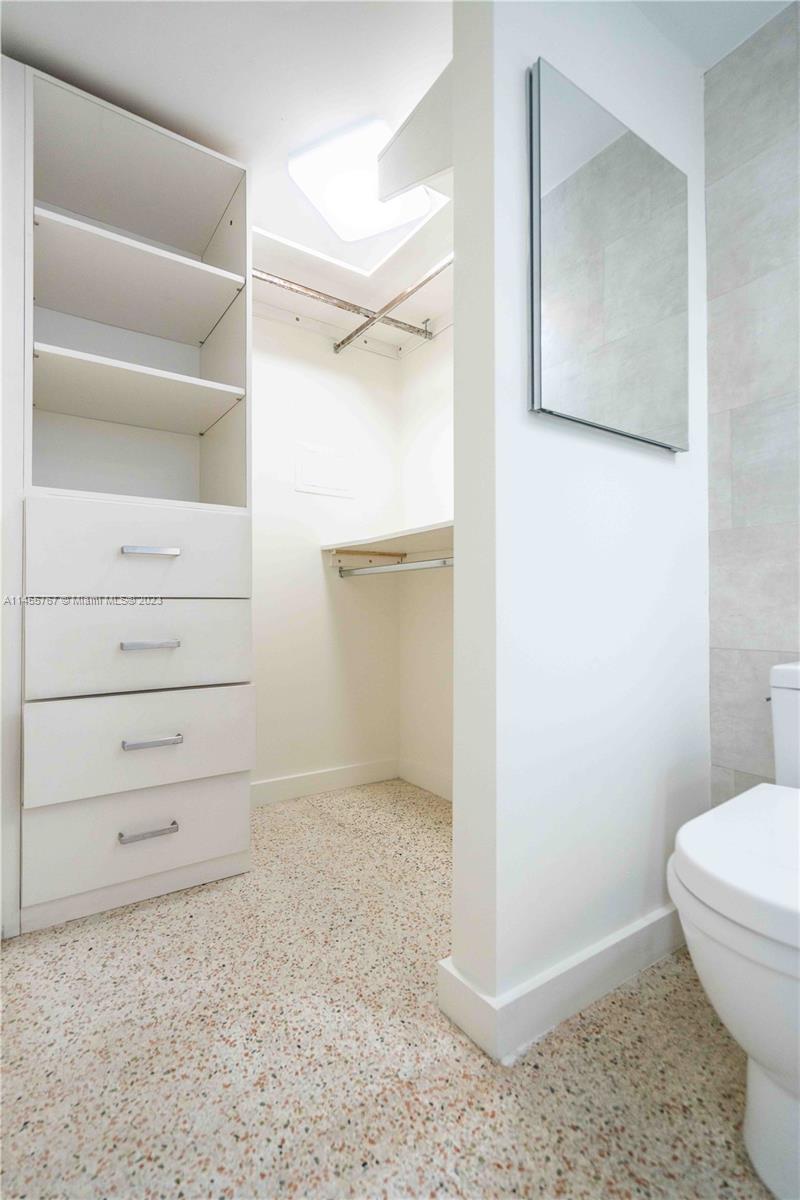 666 Northeast 80th Street, Unit 5 Miami, FL 33138 - Photo 12 of 19 a view of an empty walk in closet