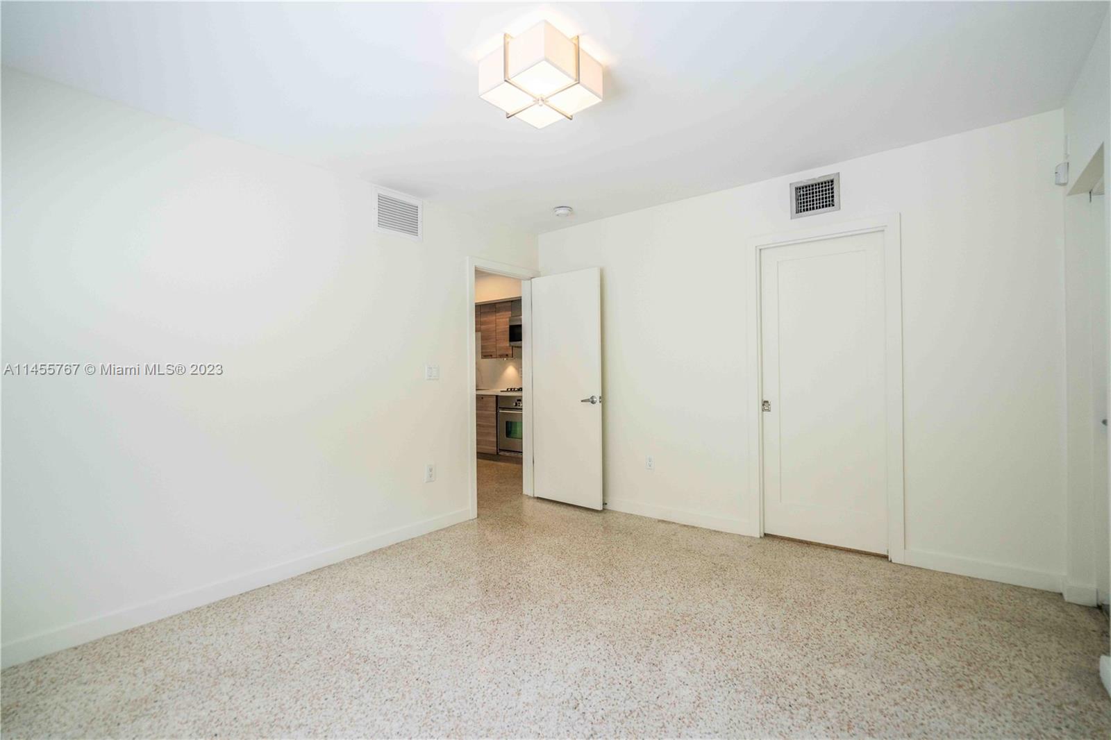 666 Northeast 80th Street, Unit 5 Miami, FL 33138 - Photo 8 of 19 a view of an empty room