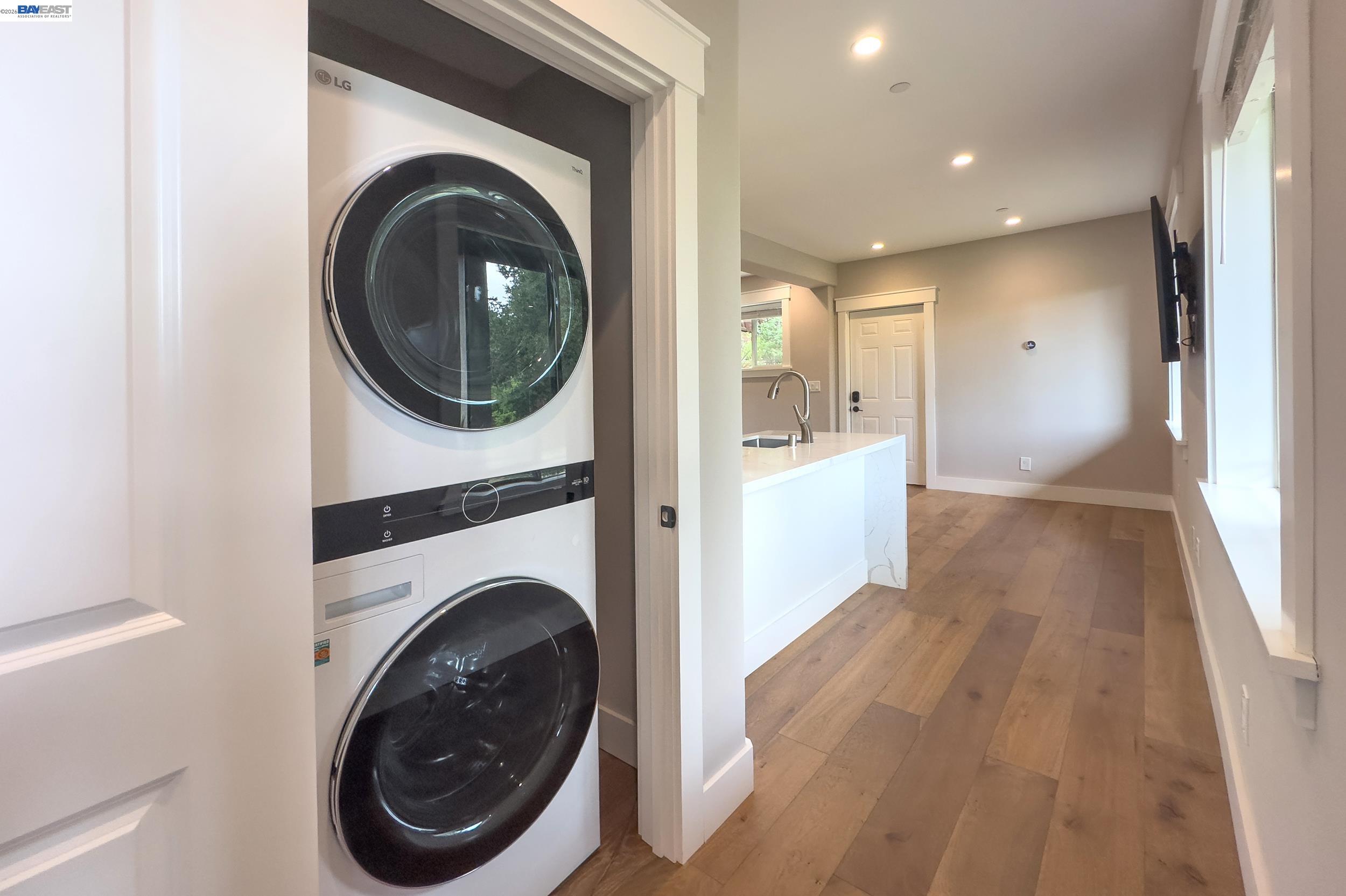 1516 Pleasant Hill Road Lafayette, CA 94549 - Photo 27 of 38 a view of a hallway with washer and dryer