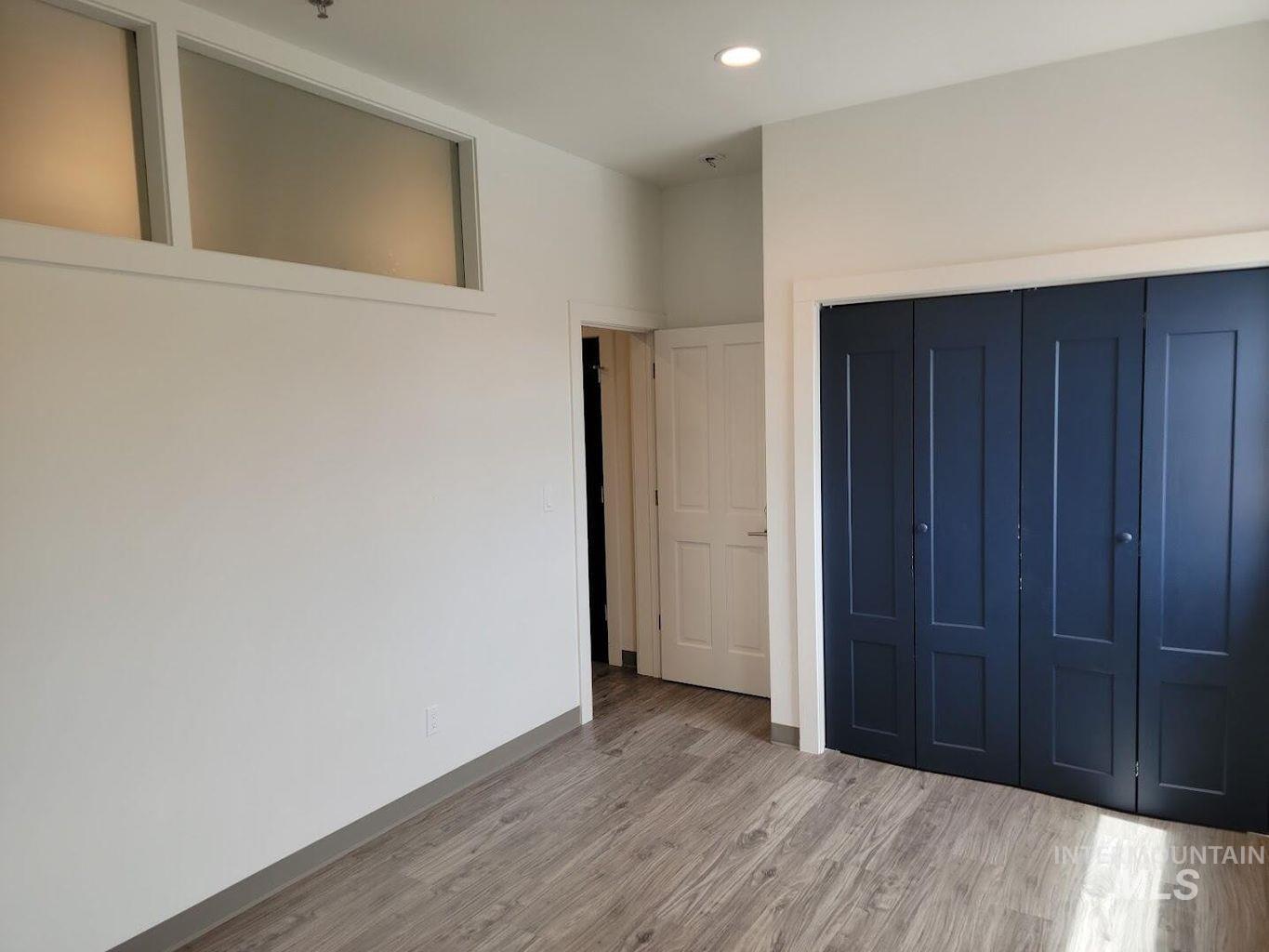121 Honeysuckle Street Bellevue, ID 83313 - Photo 4 of 13 Unfurnished bedroom with a closet, light wood-style flooring, and recessed lighting