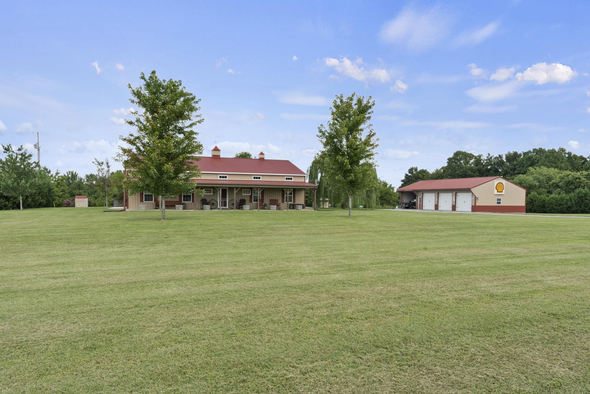 407 Moore Link Road Portland, TN 37148 - Photo 50 of 53 a front view of a house with a garden
